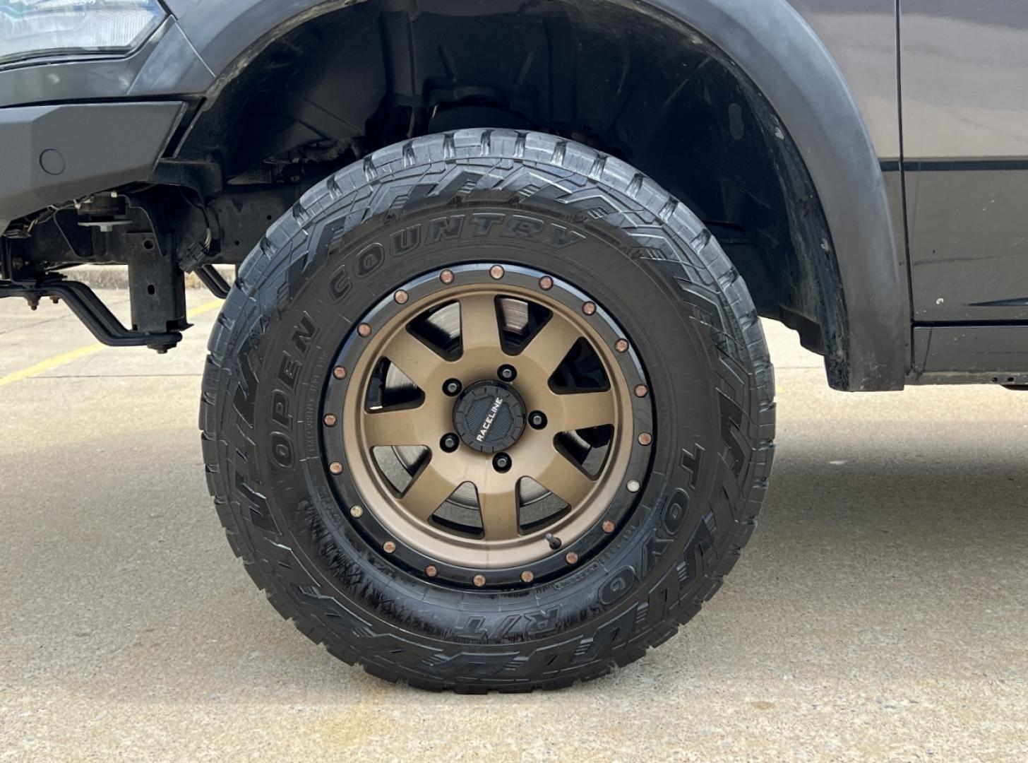 2015 GRAY /Black/Red Ram 1500 Rebel (1C6RR7YTXFS) with an HEMI 5.7L V8 engine, Automatic transmission, located at 506 S. Kingshighway, Cape Girardeau, MO, 63703, (573) 235-5000, 37.294991, -89.553635 - 2015 Ram 1500 Rebel 147xxx miles 4x4 5.7L V8 HEMI Automatic Backup Camera Power Driver Seat Heated Seats Heated Steering Wheel Bluetooth Remote Start Cruise Power Windows/Locks/Mirrors We have financing available and we accept trades! Fill out a credit application on our website or come - Photo#35