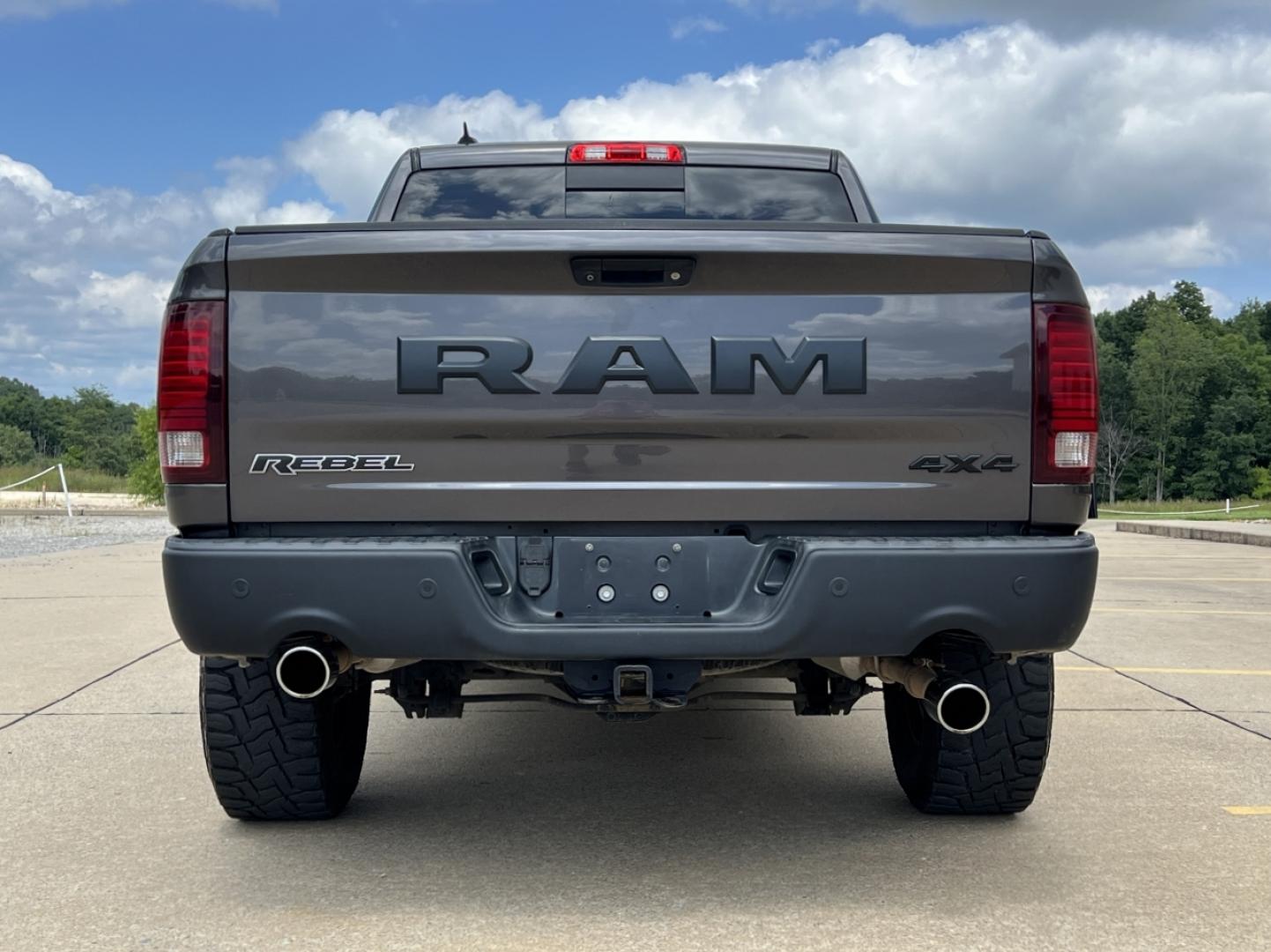 2015 GRAY /Black/Red Ram 1500 Rebel (1C6RR7YTXFS) with an HEMI 5.7L V8 engine, Automatic transmission, located at 506 S. Kingshighway, Cape Girardeau, MO, 63703, (573) 235-5000, 37.294991, -89.553635 - 2015 Ram 1500 Rebel 147xxx miles 4x4 5.7L V8 HEMI Automatic Backup Camera Power Driver Seat Heated Seats Heated Steering Wheel Bluetooth Remote Start Cruise Power Windows/Locks/Mirrors We have financing available and we accept trades! Fill out a credit application on our website or come - Photo#12