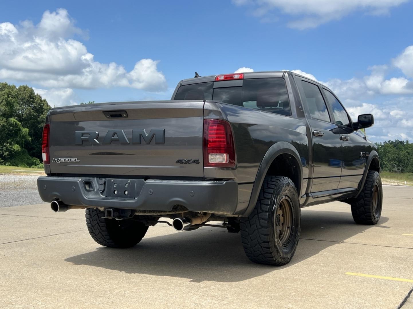 2015 GRAY /Black/Red Ram 1500 Rebel (1C6RR7YTXFS) with an HEMI 5.7L V8 engine, Automatic transmission, located at 506 S. Kingshighway, Cape Girardeau, MO, 63703, (573) 235-5000, 37.294991, -89.553635 - 2015 Ram 1500 Rebel 147xxx miles 4x4 5.7L V8 HEMI Automatic Backup Camera Power Driver Seat Heated Seats Heated Steering Wheel Bluetooth Remote Start Cruise Power Windows/Locks/Mirrors We have financing available and we accept trades! Fill out a credit application on our website or come - Photo#10