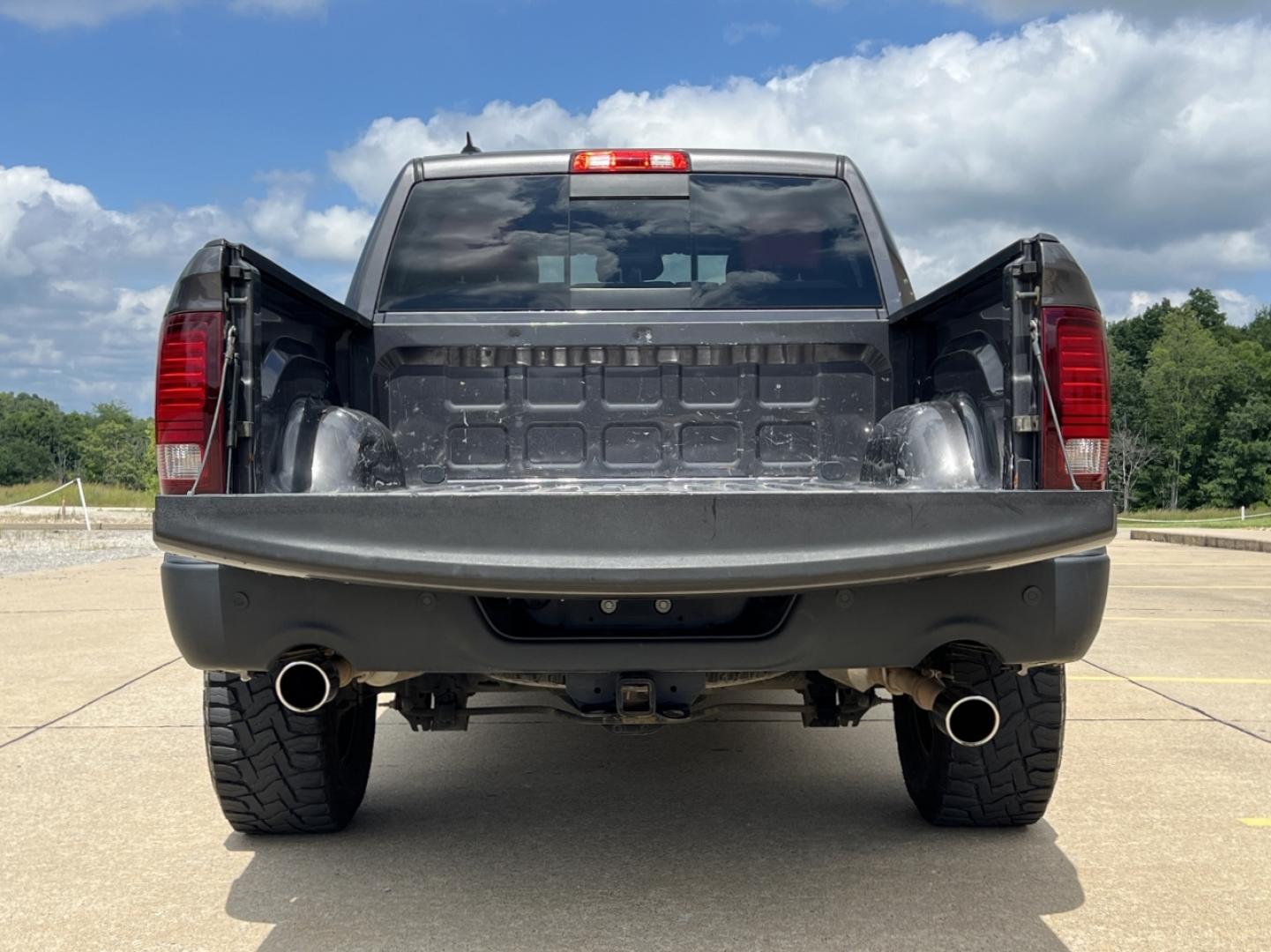 2015 GRAY /Black/Red Ram 1500 Rebel (1C6RR7YTXFS) with an HEMI 5.7L V8 engine, Automatic transmission, located at 506 S. Kingshighway, Cape Girardeau, MO, 63703, (573) 235-5000, 37.294991, -89.553635 - 2015 Ram 1500 Rebel 147xxx miles 4x4 5.7L V8 HEMI Automatic Backup Camera Power Driver Seat Heated Seats Heated Steering Wheel Bluetooth Remote Start Cruise Power Windows/Locks/Mirrors We have financing available and we accept trades! Fill out a credit application on our website or come - Photo#20