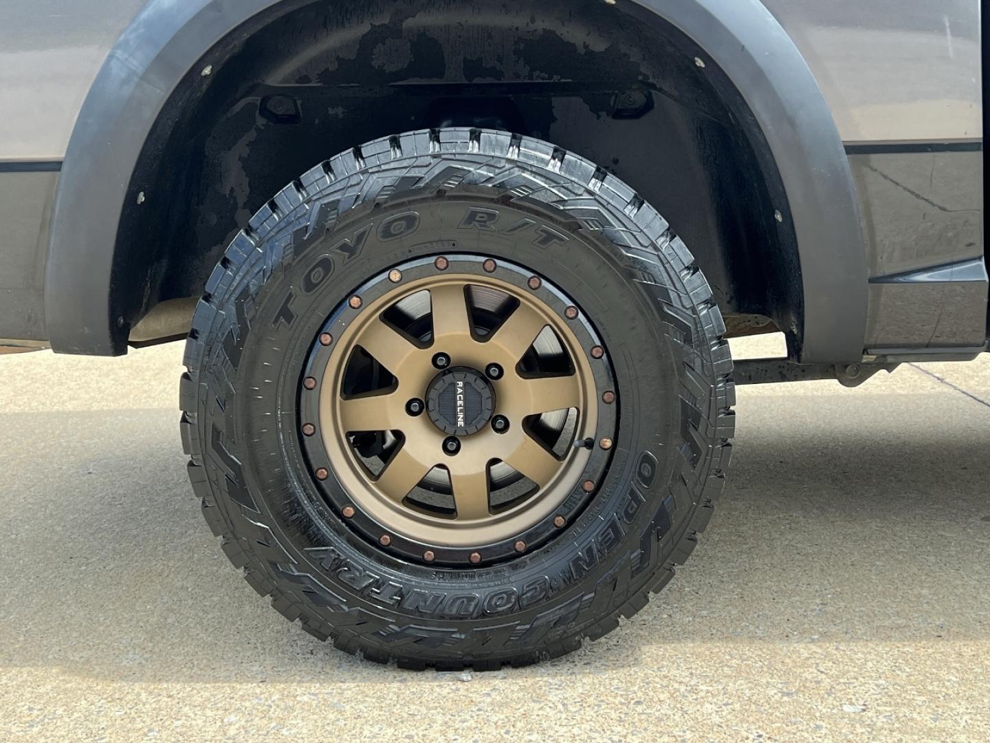 2015 GRAY /Black/Red Ram 1500 Rebel (1C6RR7YTXFS) with an HEMI 5.7L V8 engine, Automatic transmission, located at 506 S. Kingshighway, Cape Girardeau, MO, 63703, (573) 235-5000, 37.294991, -89.553635 - 2015 Ram 1500 Rebel 147xxx miles 4x4 5.7L V8 HEMI Automatic Backup Camera Power Driver Seat Heated Seats Heated Steering Wheel Bluetooth Remote Start Cruise Power Windows/Locks/Mirrors We have financing available and we accept trades! Fill out a credit application on our website or come - Photo#37
