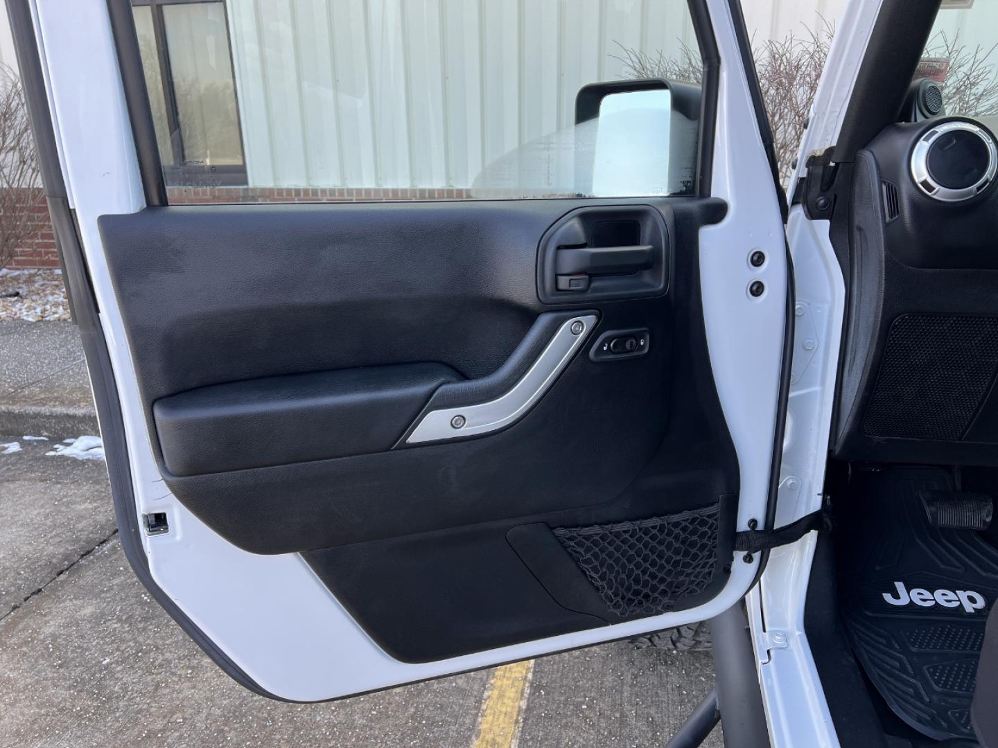 2014 WHITE /Black Cloth Jeep Wrangler Unlimited Sahara (1C4BJWEG1EL) with an 3.6L V6 engine, Automatic transmission, located at 2990 Old Orchard Rd., Jackson, MO, 63755, 37.354214, -89.612106 - 2014 Jeep Wrangler Unlimited Sahara Only 48xxx miles 4x4 3.6L V6 Automatic Local Trade-In 20" Wheels Cruise Power Windows/Locks/Mirrors We have financing available and we accept trades! Fill out a credit application on our website or come by today! If you have any questions, give us a call - Photo#10