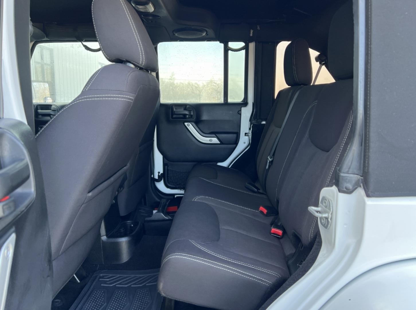 2014 WHITE /Black Cloth Jeep Wrangler Unlimited Sahara (1C4BJWEG1EL) with an 3.6L V6 engine, Automatic transmission, located at 2990 Old Orchard Rd., Jackson, MO, 63755, 37.354214, -89.612106 - 2014 Jeep Wrangler Unlimited Sahara Only 48xxx miles 4x4 3.6L V6 Automatic Local Trade-In 20" Wheels Cruise Power Windows/Locks/Mirrors We have financing available and we accept trades! Fill out a credit application on our website or come by today! If you have any questions, give us a call - Photo#14