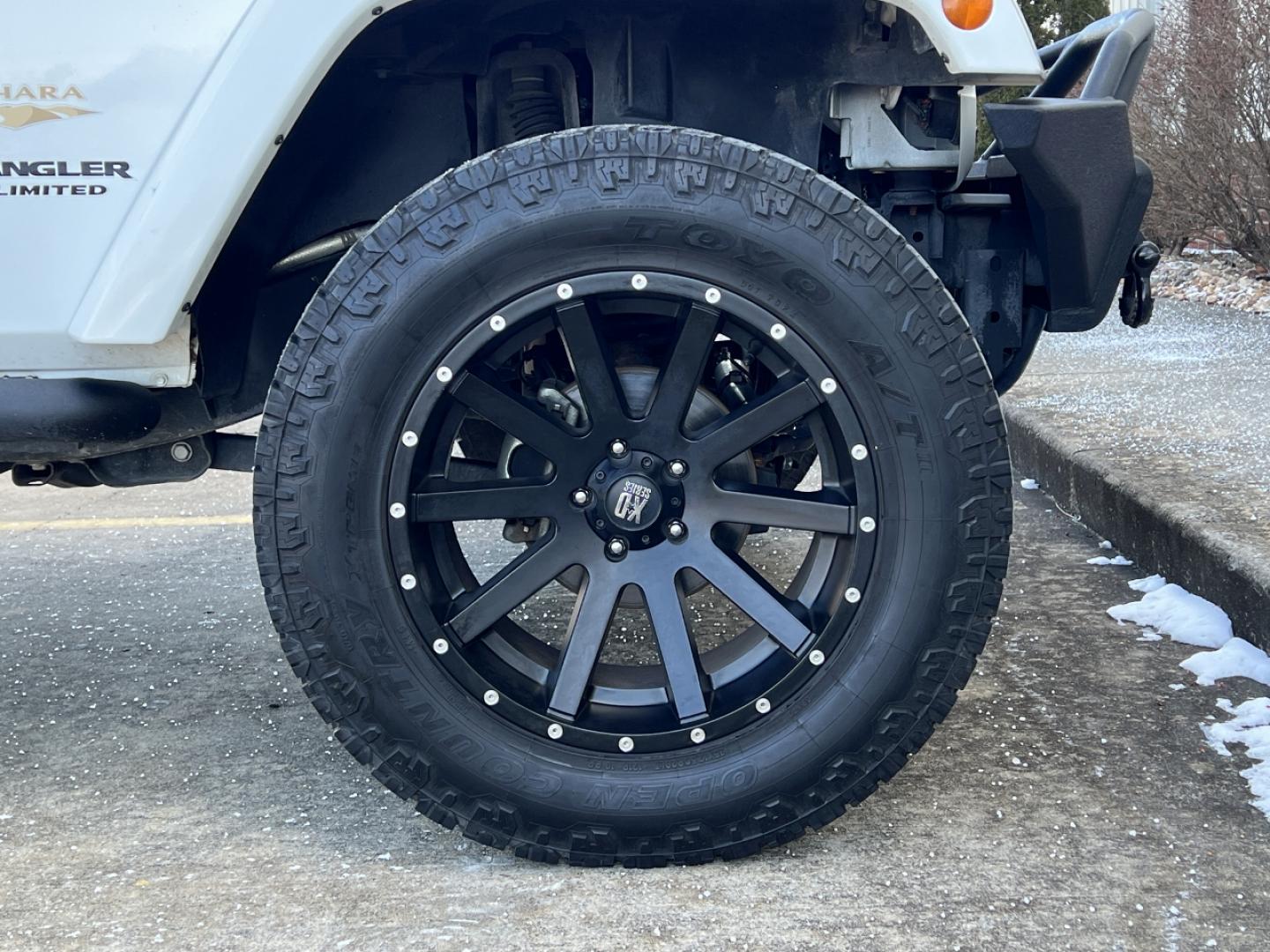 2014 WHITE /Black Cloth Jeep Wrangler Unlimited Sahara (1C4BJWEG1EL) with an 3.6L V6 engine, Automatic transmission, located at 2990 Old Orchard Rd., Jackson, MO, 63755, 37.354214, -89.612106 - 2014 Jeep Wrangler Unlimited Sahara Only 48xxx miles 4x4 3.6L V6 Automatic Local Trade-In 20" Wheels Cruise Power Windows/Locks/Mirrors We have financing available and we accept trades! Fill out a credit application on our website or come by today! If you have any questions, give us a call - Photo#32