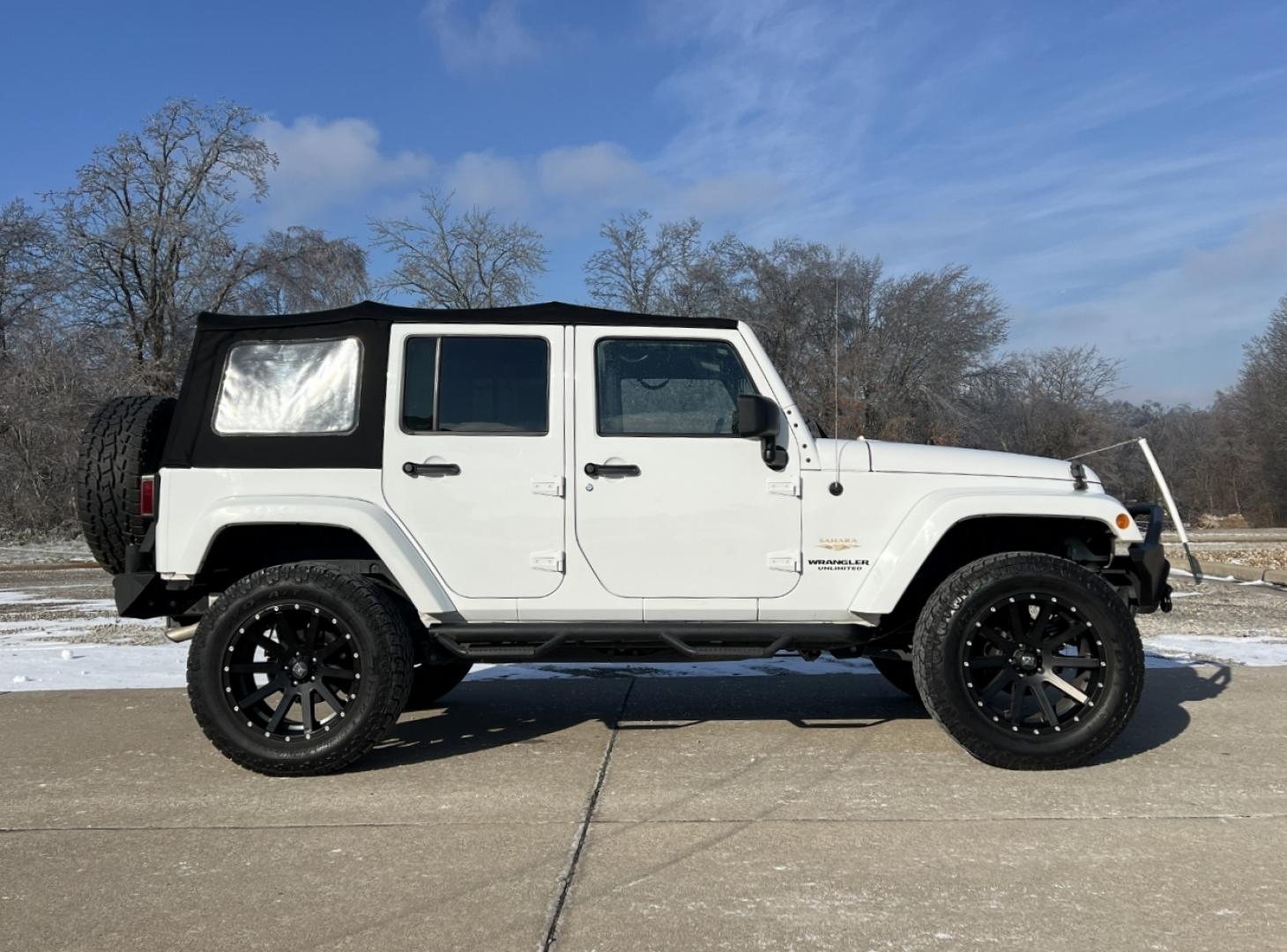2014 WHITE /Black Cloth Jeep Wrangler Unlimited Sahara (1C4BJWEG1EL) with an 3.6L V6 engine, Automatic transmission, located at 2990 Old Orchard Rd., Jackson, MO, 63755, 37.354214, -89.612106 - 2014 Jeep Wrangler Unlimited Sahara Only 48xxx miles 4x4 3.6L V6 Automatic Local Trade-In 20" Wheels Cruise Power Windows/Locks/Mirrors We have financing available and we accept trades! Fill out a credit application on our website or come by today! If you have any questions, give us a call - Photo#5