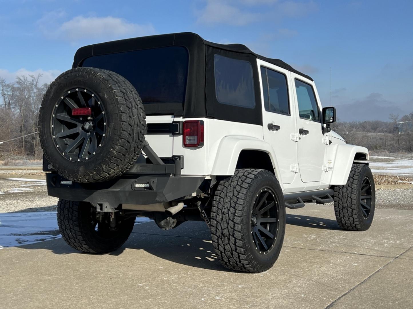 2014 WHITE /Black Cloth Jeep Wrangler Unlimited Sahara (1C4BJWEG1EL) with an 3.6L V6 engine, Automatic transmission, located at 2990 Old Orchard Rd., Jackson, MO, 63755, 37.354214, -89.612106 - 2014 Jeep Wrangler Unlimited Sahara Only 48xxx miles 4x4 3.6L V6 Automatic Local Trade-In 20" Wheels Cruise Power Windows/Locks/Mirrors We have financing available and we accept trades! Fill out a credit application on our website or come by today! If you have any questions, give us a call - Photo#6