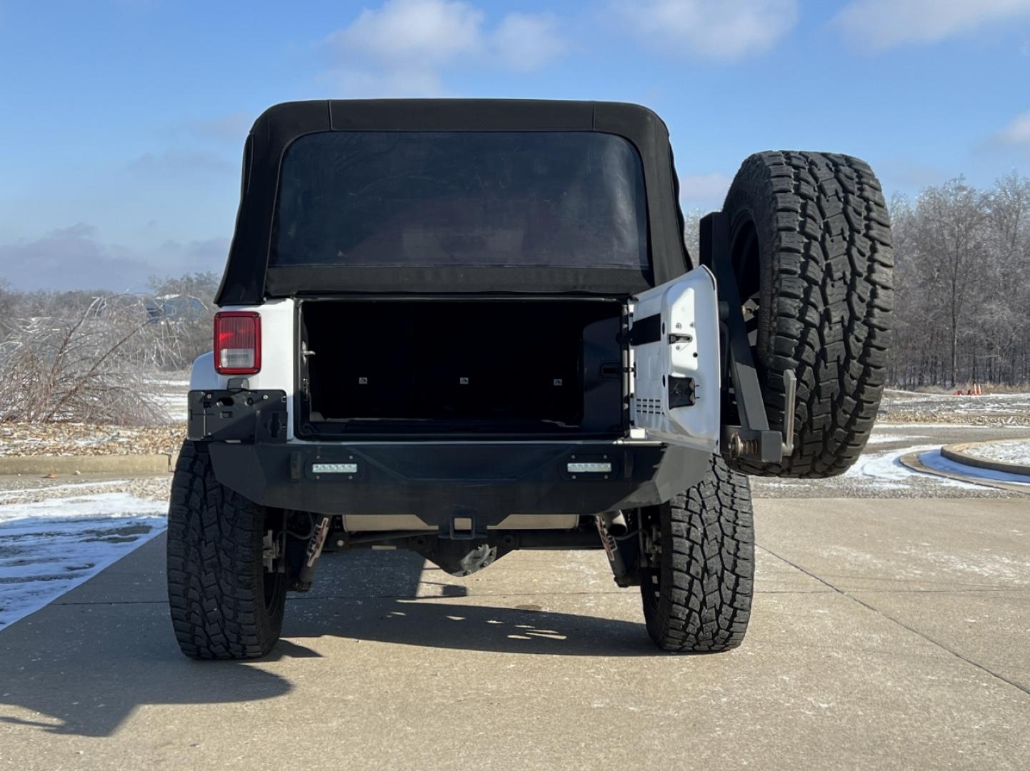 2014 WHITE /Black Cloth Jeep Wrangler Unlimited Sahara (1C4BJWEG1EL) with an 3.6L V6 engine, Automatic transmission, located at 2990 Old Orchard Rd., Jackson, MO, 63755, 37.354214, -89.612106 - 2014 Jeep Wrangler Unlimited Sahara Only 48xxx miles 4x4 3.6L V6 Automatic Local Trade-In 20" Wheels Cruise Power Windows/Locks/Mirrors We have financing available and we accept trades! Fill out a credit application on our website or come by today! If you have any questions, give us a call - Photo#16