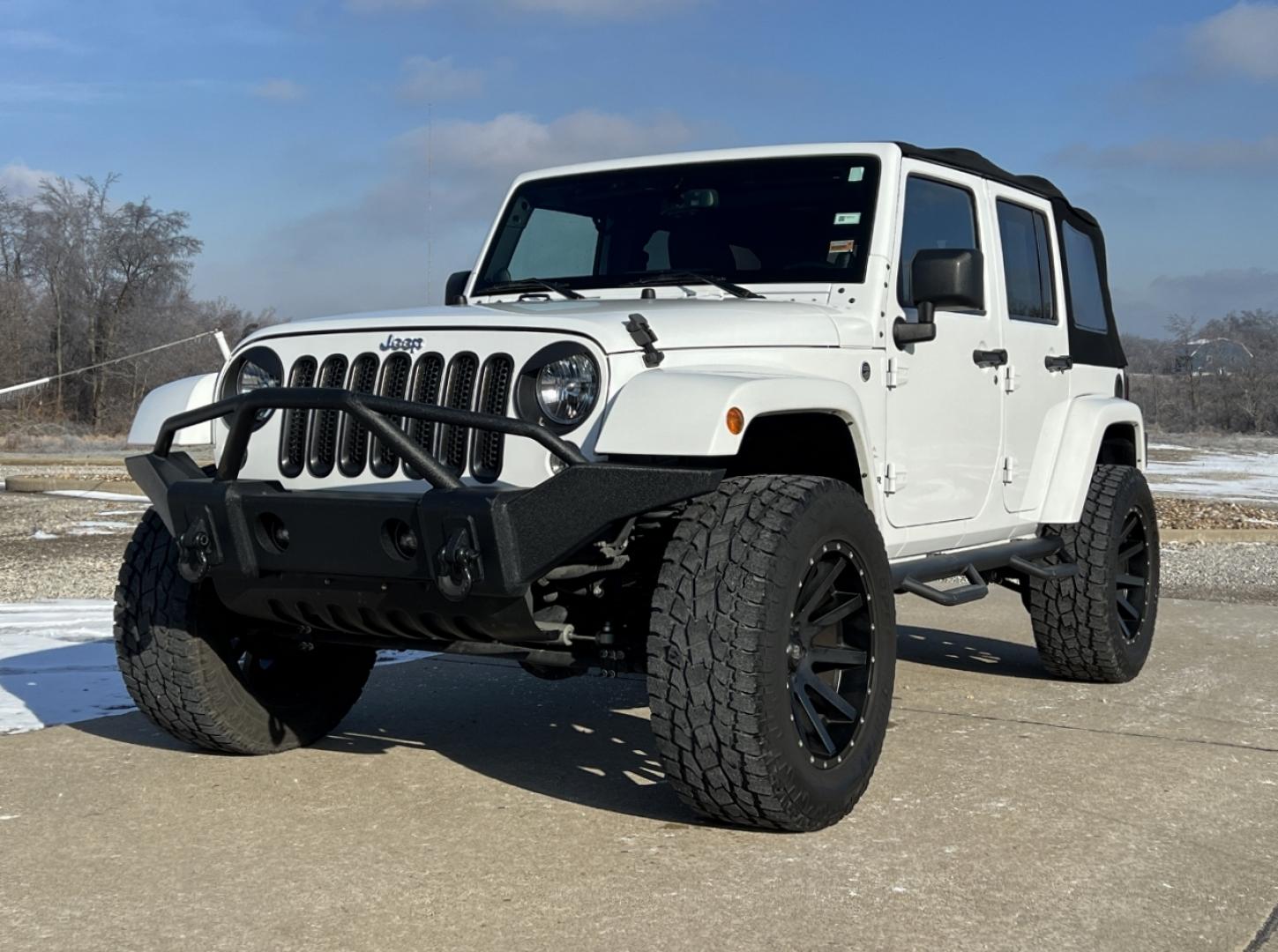 2014 WHITE /Black Cloth Jeep Wrangler Unlimited Sahara (1C4BJWEG1EL) with an 3.6L V6 engine, Automatic transmission, located at 2990 Old Orchard Rd., Jackson, MO, 63755, 37.354214, -89.612106 - 2014 Jeep Wrangler Unlimited Sahara Only 48xxx miles 4x4 3.6L V6 Automatic Local Trade-In 20" Wheels Cruise Power Windows/Locks/Mirrors We have financing available and we accept trades! Fill out a credit application on our website or come by today! If you have any questions, give us a call - Photo#3