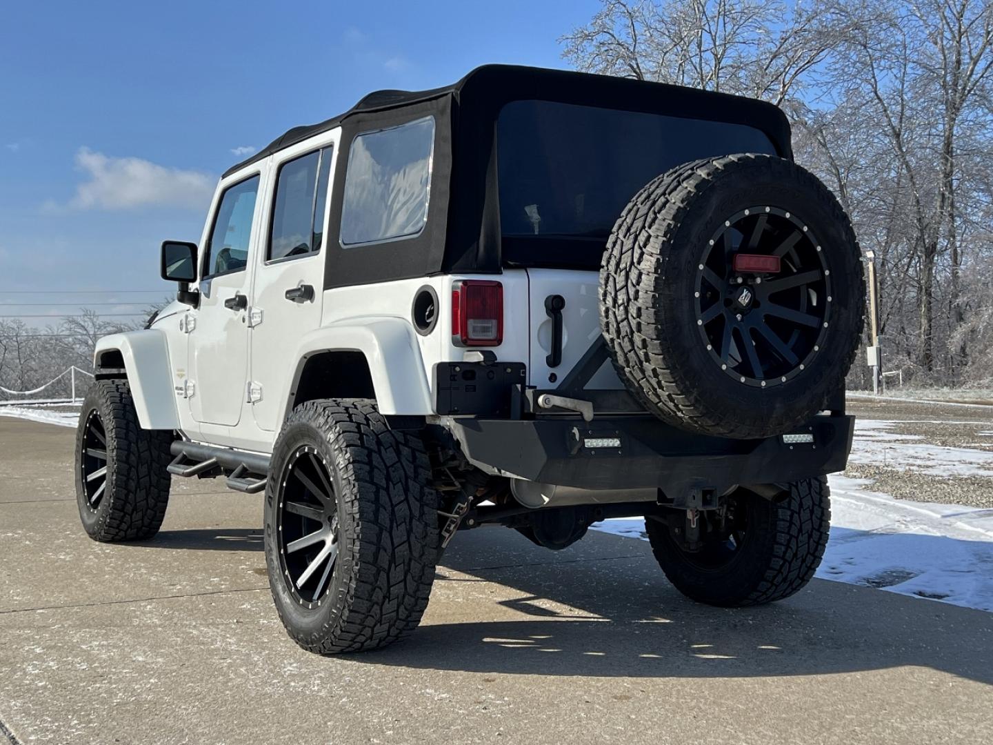 2014 WHITE /Black Cloth Jeep Wrangler Unlimited Sahara (1C4BJWEG1EL) with an 3.6L V6 engine, Automatic transmission, located at 2990 Old Orchard Rd., Jackson, MO, 63755, 37.354214, -89.612106 - 2014 Jeep Wrangler Unlimited Sahara Only 48xxx miles 4x4 3.6L V6 Automatic Local Trade-In 20" Wheels Cruise Power Windows/Locks/Mirrors We have financing available and we accept trades! Fill out a credit application on our website or come by today! If you have any questions, give us a call - Photo#7