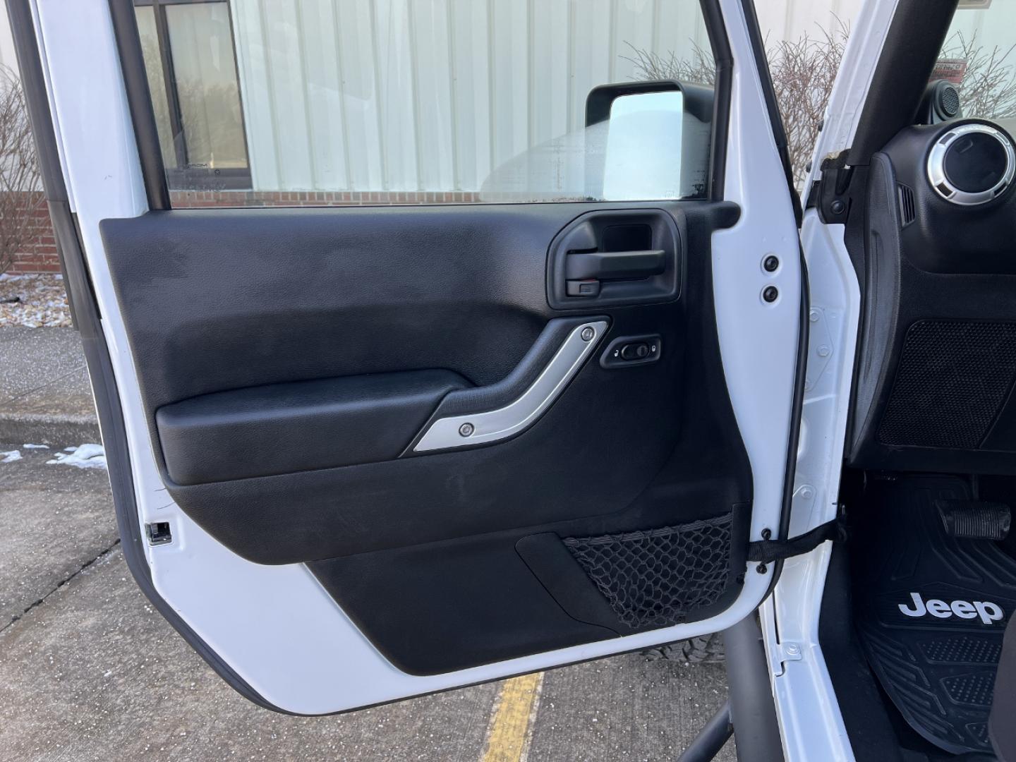 2014 WHITE /Black Cloth Jeep Wrangler Unlimited Sahara (1C4BJWEG1EL) with an 3.6L V6 engine, Automatic transmission, located at 506 S. Kingshighway, Cape Girardeau, MO, 63703, (573) 235-5000, 37.294994, -89.556206 - 2014 Jeep Wrangler Unlimited Sahara Only 48xxx miles 4x4 3.6L V6 Automatic Local Trade-In 20" Wheels Cruise Power Windows/Locks/Mirrors We have financing available and we accept trades! Fill out a credit application on our website or come by today! If you have any questions, give us a call - Photo#10
