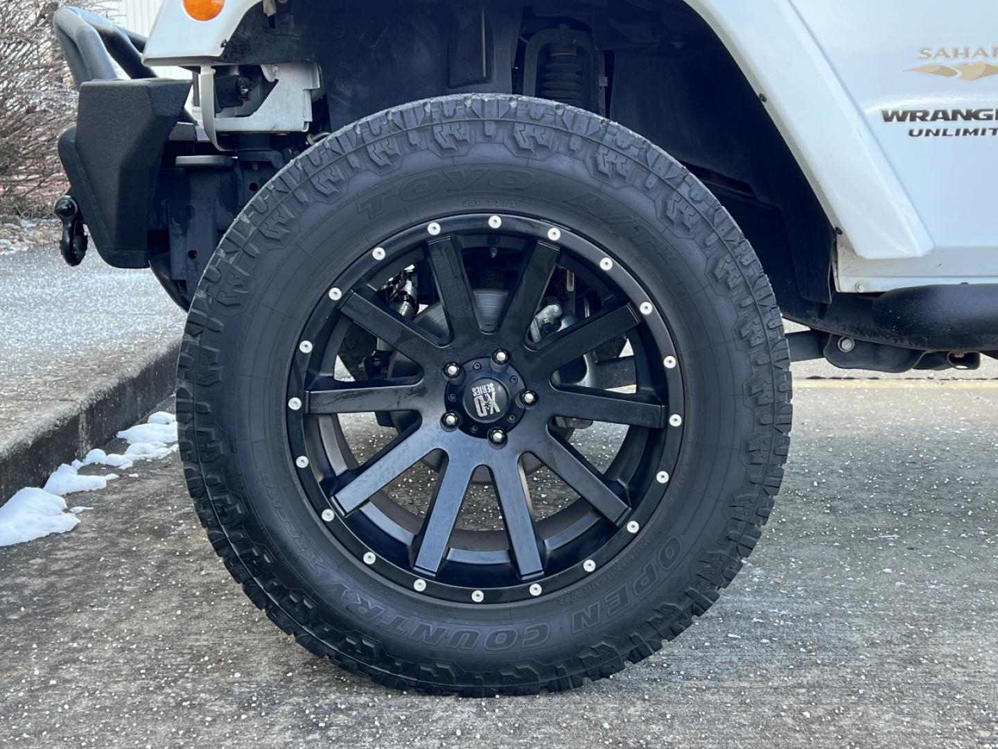 2014 WHITE /Black Cloth Jeep Wrangler Unlimited Sahara (1C4BJWEG1EL) with an 3.6L V6 engine, Automatic transmission, located at 506 S. Kingshighway, Cape Girardeau, MO, 63703, (573) 235-5000, 37.294994, -89.556206 - 2014 Jeep Wrangler Unlimited Sahara Only 48xxx miles 4x4 3.6L V6 Automatic Local Trade-In 20" Wheels Cruise Power Windows/Locks/Mirrors We have financing available and we accept trades! Fill out a credit application on our website or come by today! If you have any questions, give us a call - Photo#28