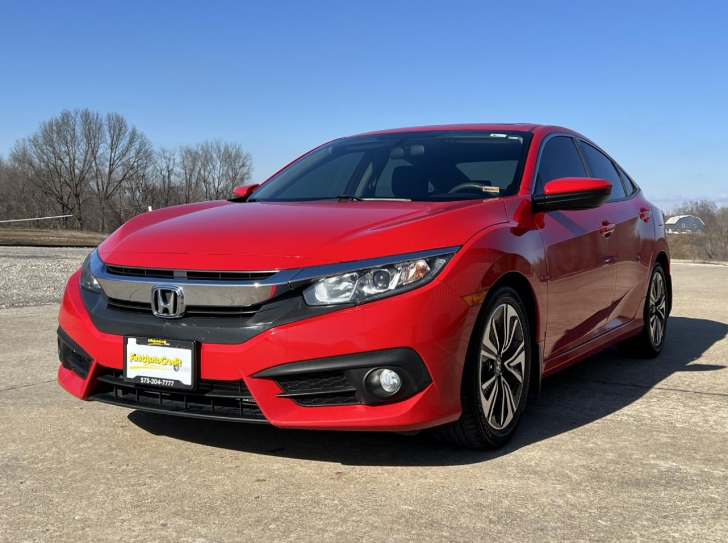 2017 RED /Black Cloth Honda Civic EX-T Sedan CVT (2HGFC1F31HH) with an 1.5L 4 Cyl. TURBO engine, CVT transmission, located at 2990 Old Orchard Rd., Jackson, MO, 63755, 37.354214, -89.612106 - 2017 Honda Civic EX-T Local 1-Owner 144xxx miles Front Wheel Drive 1.5L 4 Cyl. Automatic Backup Camera Heated Seats Sunroof Bluetooth Cruise Remote Start Power Windows/Locks/Mirrors We have financing available and we accept trades! Fill out a credit application on our website or come by - Photo#6