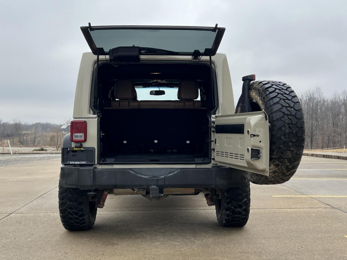 2017 TAN /Tan Leather Jeep Wrangler Unlimited Rubicon 4WD (1C4HJWFG9HL) with an 3.6L V6 engine, Automatic transmission, located at 2990 Old Orchard Rd., Jackson, MO, 63755, 37.354214, -89.612106 - 2017 Jeep Wrangler Unlimited Rubicon Only 76xxx miles 4 Wheel Drive 3.6L V6 Automatic Leather Navigation Heated Seats Bluetooth Cruise Remote Start Power Windows/Locks/Mirrors We have financing available and we accept trades! Fill out a credit application on our website or come by today - Photo#20