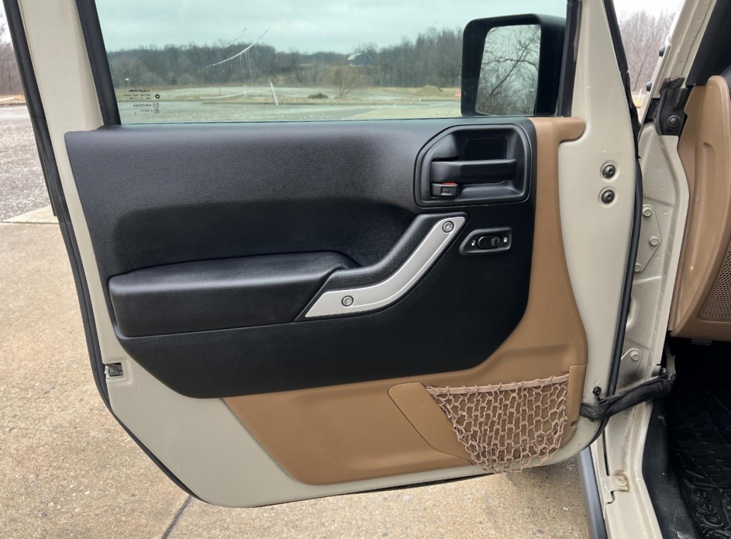 2017 TAN /Tan Leather Jeep Wrangler Unlimited Rubicon 4WD (1C4HJWFG9HL) with an 3.6L V6 engine, Automatic transmission, located at 2990 Old Orchard Rd., Jackson, MO, 63755, 37.354214, -89.612106 - 2017 Jeep Wrangler Unlimited Rubicon Only 76xxx miles 4 Wheel Drive 3.6L V6 Automatic Leather Navigation Heated Seats Bluetooth Cruise Remote Start Power Windows/Locks/Mirrors We have financing available and we accept trades! Fill out a credit application on our website or come by today - Photo#14