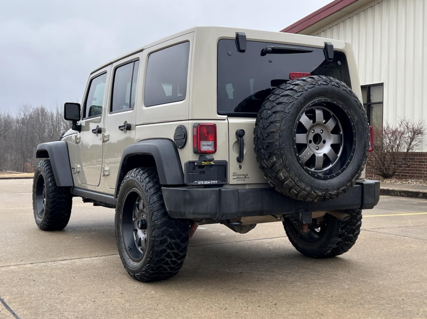 2017 TAN /Tan Leather Jeep Wrangler Unlimited Rubicon 4WD (1C4HJWFG9HL) with an 3.6L V6 engine, Automatic transmission, located at 506 S. Kingshighway, Cape Girardeau, MO, 63703, (573) 235-5000, 37.294994, -89.556206 - 2017 Jeep Wrangler Unlimited Rubicon Only 76xxx miles 4 Wheel Drive 3.6L V6 Automatic Leather Navigation Heated Seats Bluetooth Cruise Remote Start Power Windows/Locks/Mirrors We have financing available and we accept trades! Fill out a credit application on our website or come by today - Photo#10