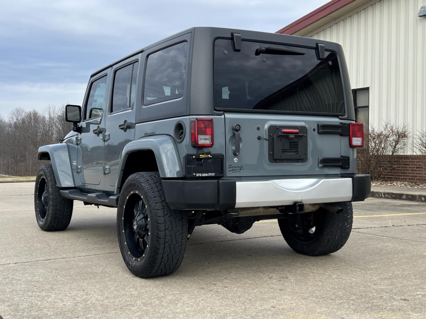 2015 GRAY /Black Cloth JEEP WRANGLER UNLIMI SAHARA (1C4HJWEG7FL) with an 3.6L V6 engine, Automatic transmission, located at 2990 Old Orchard Rd., Jackson, MO, 63755, 37.354214, -89.612106 - 2015 Jeep Wrangler Unlimited Sahara 114xxx miles 4 Wheel Drive 3.6L V6 Automatic Navigation Heated Seats 20" Wheels Bluetooth Cruise Power Windows/Locks/Mirrors We have financing available and we accept trades! Fill out a credit application on our website or come by today! If you have an - Photo#9