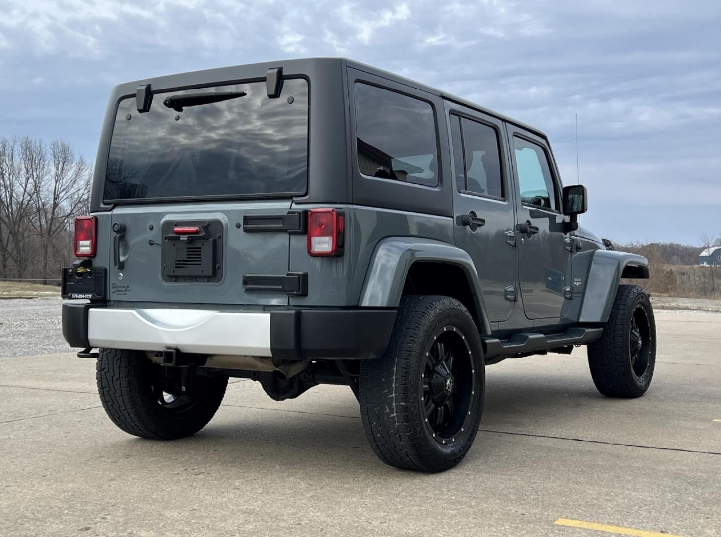 2015 GRAY /Black Cloth JEEP WRANGLER UNLIMI SAHARA (1C4HJWEG7FL) with an 3.6L V6 engine, Automatic transmission, located at 2990 Old Orchard Rd., Jackson, MO, 63755, 37.354214, -89.612106 - 2015 Jeep Wrangler Unlimited Sahara 114xxx miles 4 Wheel Drive 3.6L V6 Automatic Navigation Heated Seats 20" Wheels Bluetooth Cruise Power Windows/Locks/Mirrors We have financing available and we accept trades! Fill out a credit application on our website or come by today! If you have an - Photo#8