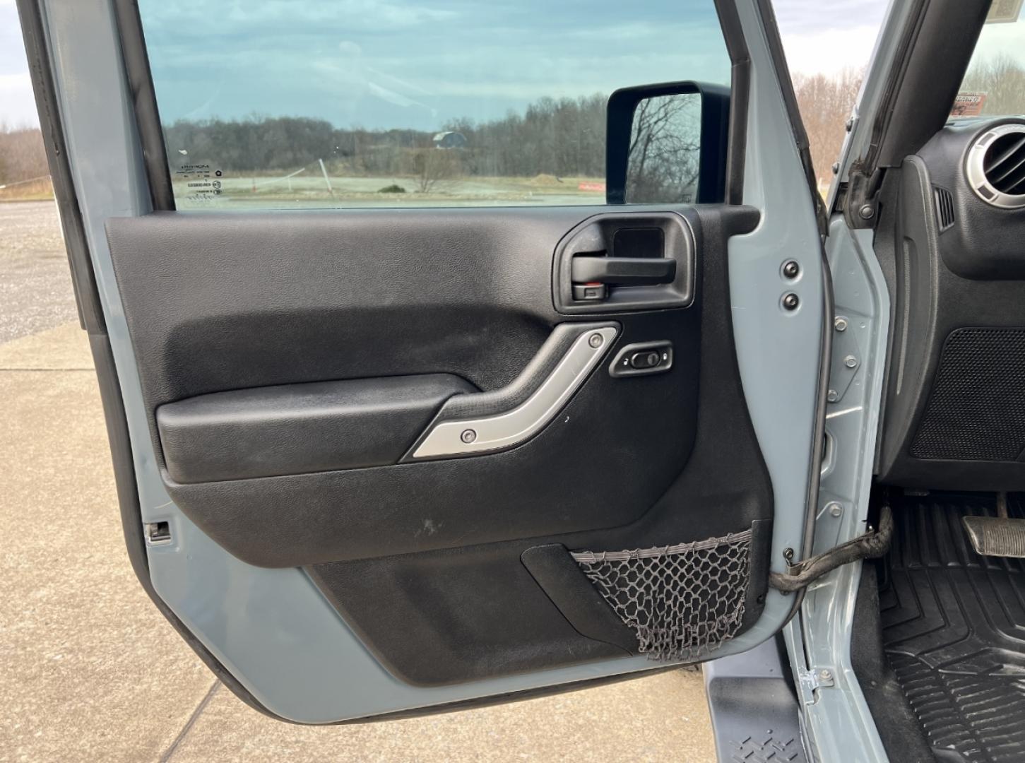 2015 GRAY /Black Cloth JEEP WRANGLER UNLIMI SAHARA (1C4HJWEG7FL) with an 3.6L V6 engine, Automatic transmission, located at 2990 Old Orchard Rd., Jackson, MO, 63755, 37.354214, -89.612106 - 2015 Jeep Wrangler Unlimited Sahara 114xxx miles 4 Wheel Drive 3.6L V6 Automatic Navigation Heated Seats 20" Wheels Bluetooth Cruise Power Windows/Locks/Mirrors We have financing available and we accept trades! Fill out a credit application on our website or come by today! If you have an - Photo#12