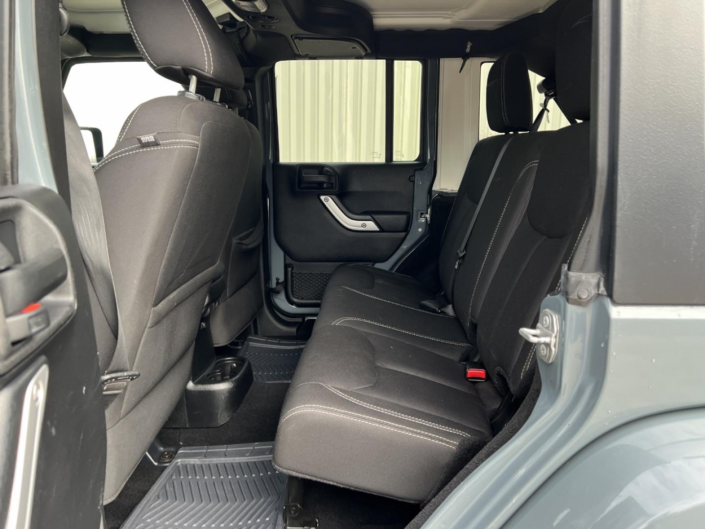 2015 GRAY /Black Cloth JEEP WRANGLER UNLIMI SAHARA (1C4HJWEG7FL) with an 3.6L V6 engine, Automatic transmission, located at 2990 Old Orchard Rd., Jackson, MO, 63755, 37.354214, -89.612106 - 2015 Jeep Wrangler Unlimited Sahara 114xxx miles 4 Wheel Drive 3.6L V6 Automatic Navigation Heated Seats 20" Wheels Bluetooth Cruise Power Windows/Locks/Mirrors We have financing available and we accept trades! Fill out a credit application on our website or come by today! If you have an - Photo#14