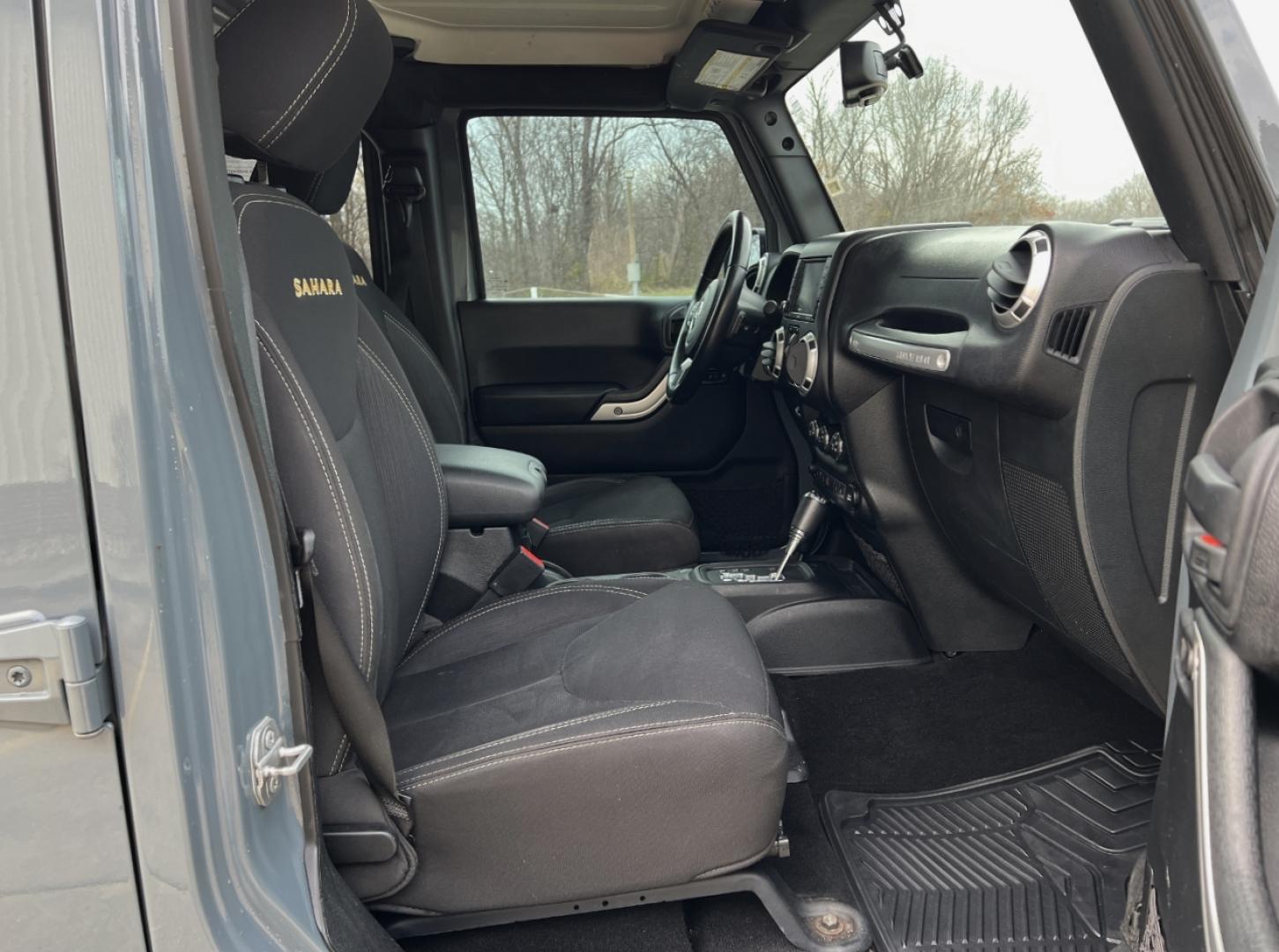 2015 GRAY /Black Cloth JEEP WRANGLER UNLIMI SAHARA (1C4HJWEG7FL) with an 3.6L V6 engine, Automatic transmission, located at 2990 Old Orchard Rd., Jackson, MO, 63755, 37.354214, -89.612106 - 2015 Jeep Wrangler Unlimited Sahara 114xxx miles 4 Wheel Drive 3.6L V6 Automatic Navigation Heated Seats 20" Wheels Bluetooth Cruise Power Windows/Locks/Mirrors We have financing available and we accept trades! Fill out a credit application on our website or come by today! If you have an - Photo#16