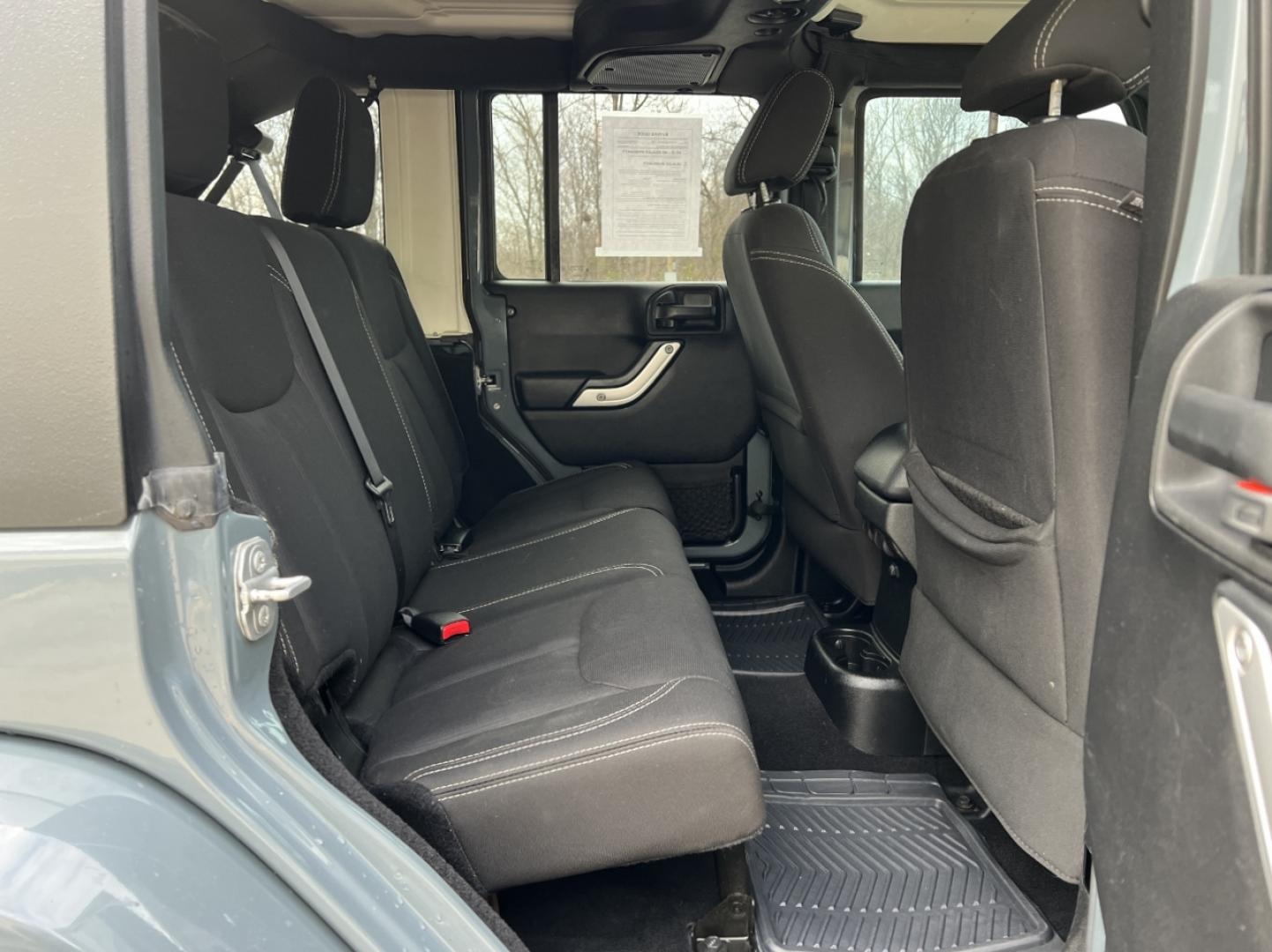2015 GRAY /Black Cloth JEEP WRANGLER UNLIMI SAHARA (1C4HJWEG7FL) with an 3.6L V6 engine, Automatic transmission, located at 2990 Old Orchard Rd., Jackson, MO, 63755, 37.354214, -89.612106 - 2015 Jeep Wrangler Unlimited Sahara 114xxx miles 4 Wheel Drive 3.6L V6 Automatic Navigation Heated Seats 20" Wheels Bluetooth Cruise Power Windows/Locks/Mirrors We have financing available and we accept trades! Fill out a credit application on our website or come by today! If you have an - Photo#17