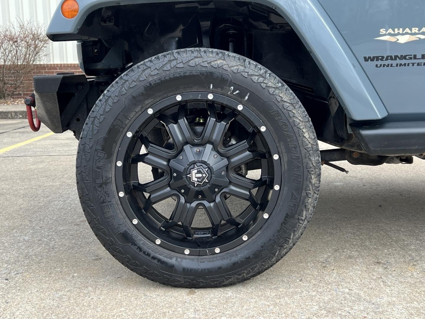 2015 GRAY /Black Cloth JEEP WRANGLER UNLIMI SAHARA (1C4HJWEG7FL) with an 3.6L V6 engine, Automatic transmission, located at 2990 Old Orchard Rd., Jackson, MO, 63755, 37.354214, -89.612106 - 2015 Jeep Wrangler Unlimited Sahara 114xxx miles 4 Wheel Drive 3.6L V6 Automatic Navigation Heated Seats 20" Wheels Bluetooth Cruise Power Windows/Locks/Mirrors We have financing available and we accept trades! Fill out a credit application on our website or come by today! If you have an - Photo#28