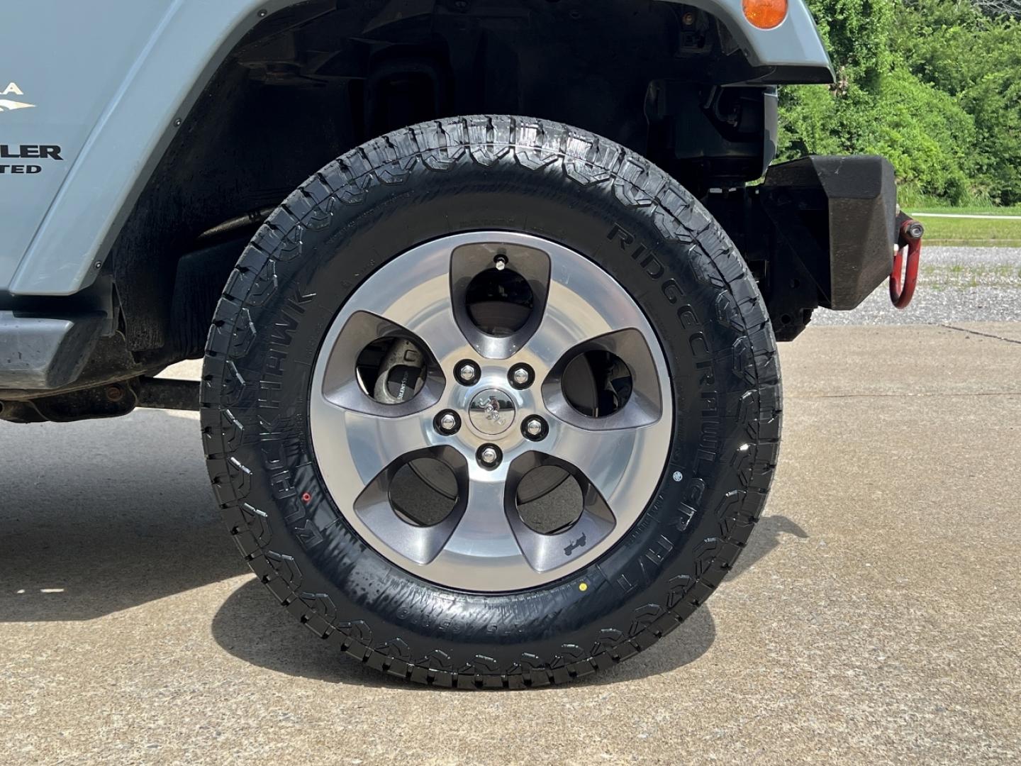 2015 GRAY /Black Cloth JEEP WRANGLER UNLIMI SAHARA (1C4HJWEG7FL) with an 3.6L V6 engine, Automatic transmission, located at 2990 Old Orchard Rd., Jackson, MO, 63755, 37.354214, -89.612106 - 2015 Jeep Wrangler Unlimited Sahara 114xxx miles 4 Wheel Drive 3.6L V6 Automatic Navigation Heated Seats 20" Wheels Bluetooth Cruise Power Windows/Locks/Mirrors We have financing available and we accept trades! Fill out a credit application on our website or come by today! If you have an - Photo#32
