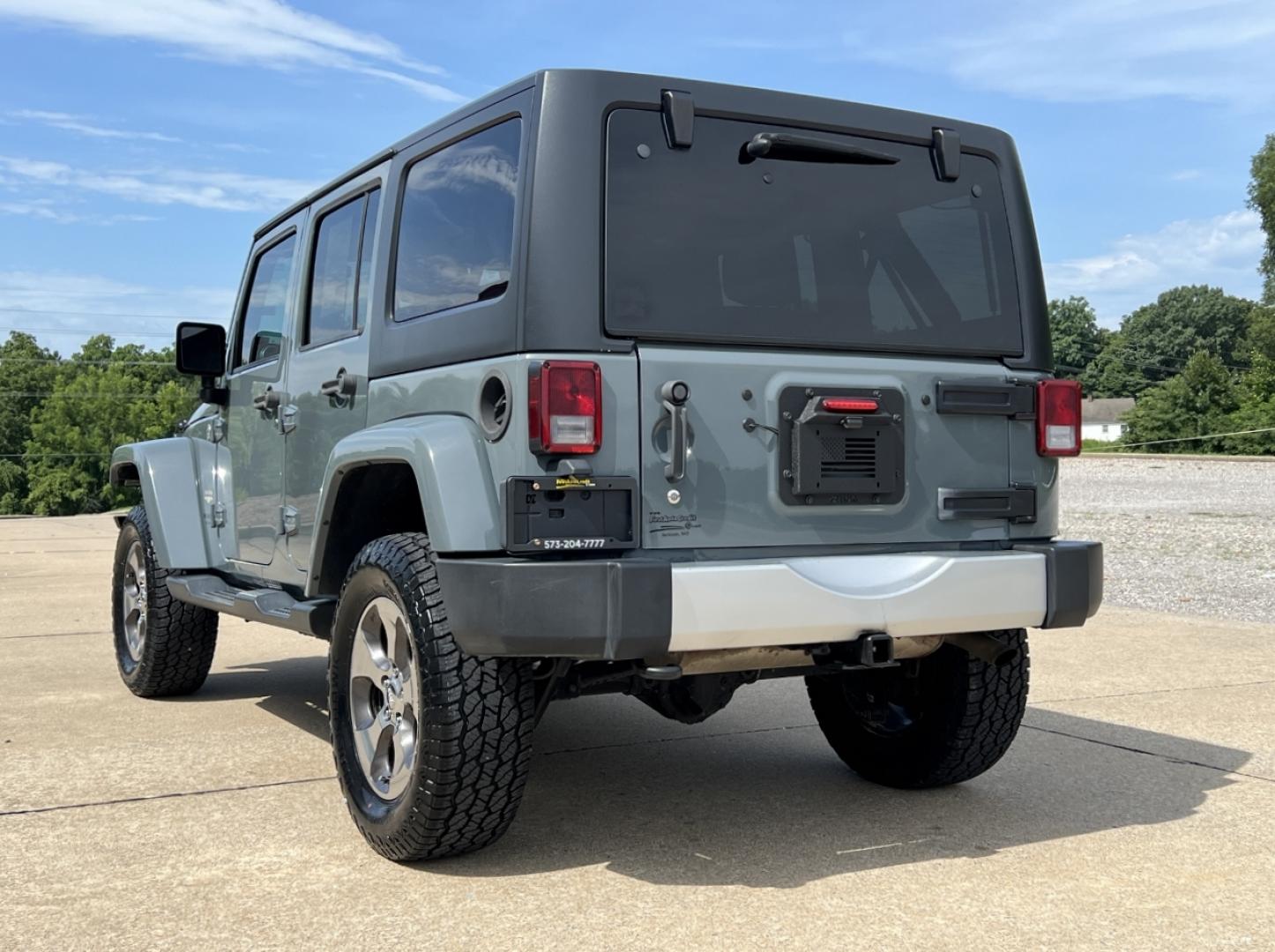 2015 GRAY /Black Cloth JEEP WRANGLER UNLIMI SAHARA (1C4HJWEG7FL) with an 3.6L V6 engine, Automatic transmission, located at 2990 Old Orchard Rd., Jackson, MO, 63755, 37.354214, -89.612106 - 2015 Jeep Wrangler Unlimited Sahara 114xxx miles 4 Wheel Drive 3.6L V6 Automatic Navigation Heated Seats 20" Wheels Bluetooth Cruise Power Windows/Locks/Mirrors We have financing available and we accept trades! Fill out a credit application on our website or come by today! If you have an - Photo#9