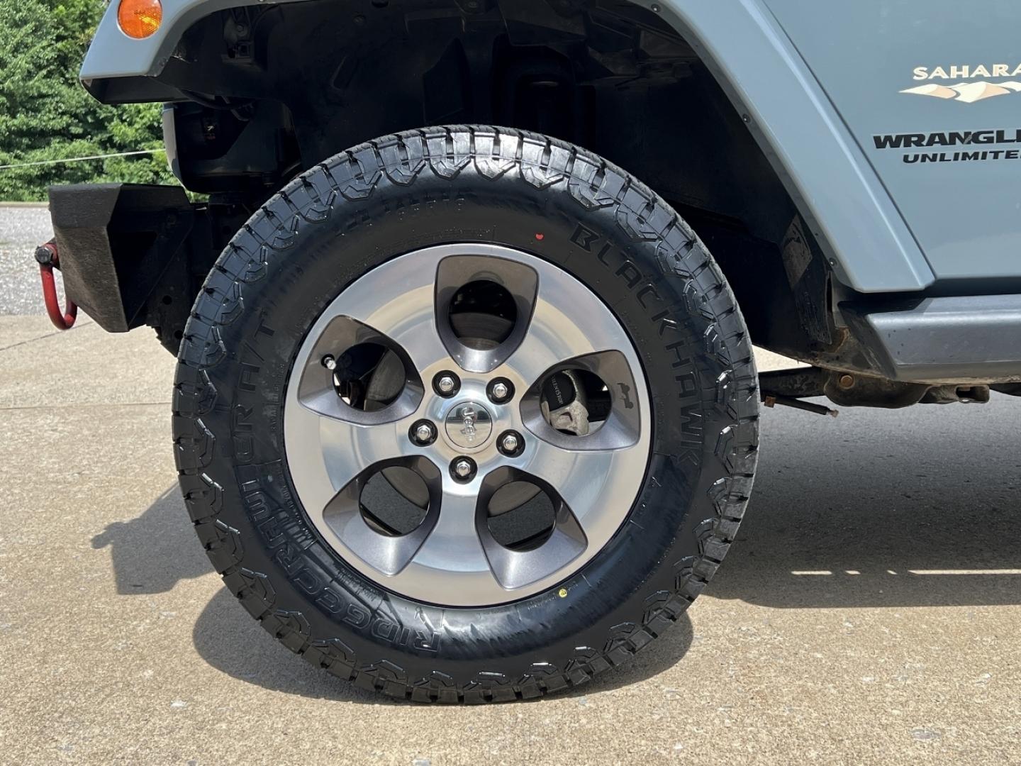 2015 GRAY /Black Cloth JEEP WRANGLER UNLIMI SAHARA (1C4HJWEG7FL) with an 3.6L V6 engine, Automatic transmission, located at 2990 Old Orchard Rd., Jackson, MO, 63755, 37.354214, -89.612106 - 2015 Jeep Wrangler Unlimited Sahara 114xxx miles 4 Wheel Drive 3.6L V6 Automatic Navigation Heated Seats 20" Wheels Bluetooth Cruise Power Windows/Locks/Mirrors We have financing available and we accept trades! Fill out a credit application on our website or come by today! If you have an - Photo#29