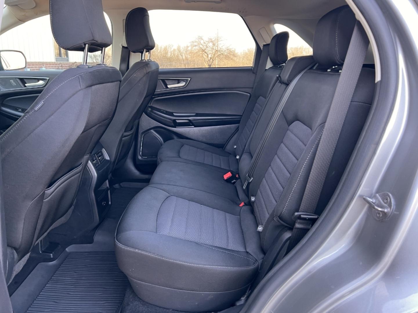 2021 SILVER /Black Cloth FORD EDGE SE (2FMPK3G94MB) with an 2.0L 4 Cyl. engine, Automatic transmission, located at 506 S. Kingshighway, Cape Girardeau, MO, 63703, 37.294994, -89.556206 - 2021 Ford Edge SE 1-Owner 89xxx miles Front Wheel Drive 2.0L 4 Cyl. Automatic New Tires Backup Camera Bluetooth Cruise Power Windows/Locks/Mirrors We have financing available and we accept trades! Fill out a credit application on our website or come by today! If you have any questions, g - Photo#14