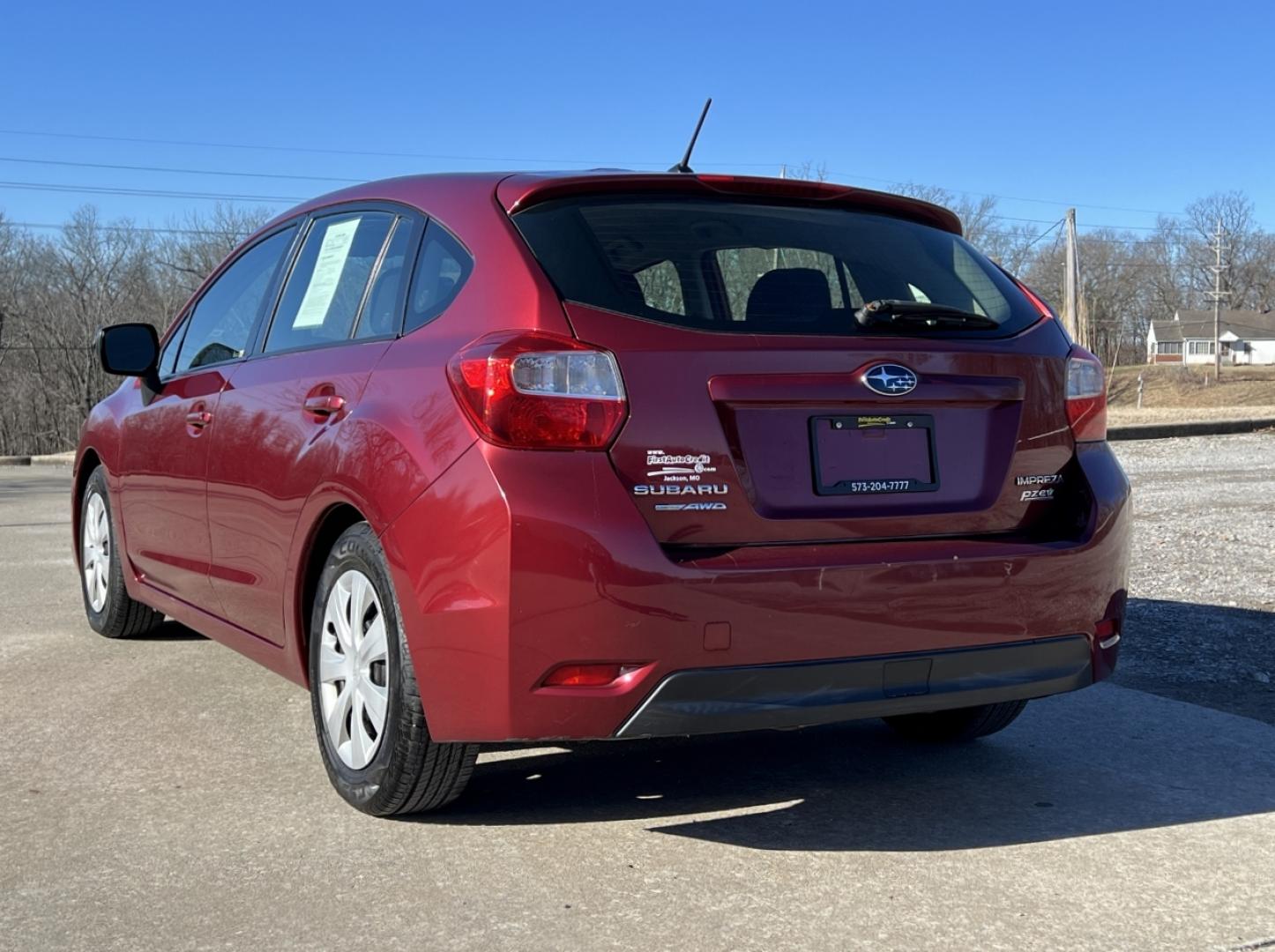2013 MAROON /Black Cloth SUBARU IMPREZA (JF1GPAA62D2) with an 2.0L 4 Cyl. engine, Continuously Variable transmission, located at 2990 Old Orchard Rd., Jackson, MO, 63755, 37.354214, -89.612106 - 2013 Subaru Impreza 124xxx miles All Wheel Drive 2.0L 4 Cyl. Automatic Cruise Power Windows/Locks/Mirrors We have financing available and we accept trades! Fill out a credit application on our website or come by today! If you have any questions, give us a call at (573) 204-7777 or visit our - Photo#6