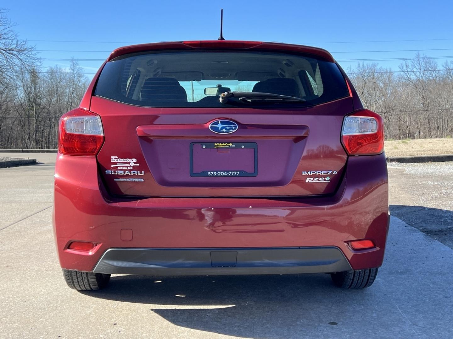 2013 MAROON /Black Cloth SUBARU IMPREZA (JF1GPAA62D2) with an 2.0L 4 Cyl. engine, Continuously Variable transmission, located at 2990 Old Orchard Rd., Jackson, MO, 63755, 37.354214, -89.612106 - 2013 Subaru Impreza 124xxx miles All Wheel Drive 2.0L 4 Cyl. Automatic Cruise Power Windows/Locks/Mirrors We have financing available and we accept trades! Fill out a credit application on our website or come by today! If you have any questions, give us a call at (573) 204-7777 or visit our - Photo#7