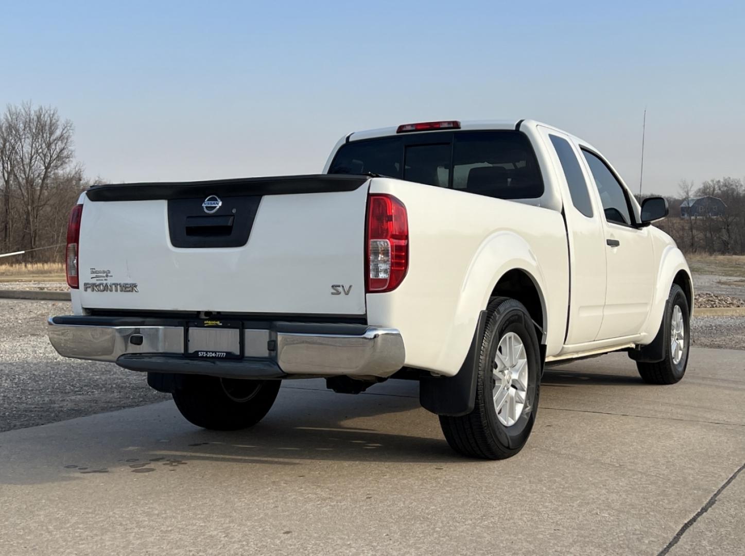 2019 WHITE /Black Cloth NISSAN FRONTIER SV (1N6BD0CT7KN) with an 2.5L 4 Cyl. engine, Automatic transmission, located at 2990 Old Orchard Rd., Jackson, MO, 63755, 37.354214, -89.612106 - 2019 Nissan Frontier SV Only 52xxx miles Rear Wheel Drive 2.5L 4 Cyl. Automatic Backup Camera Bluetooth Cruise Power Windows/Locks/Mirrors We have financing available and we accept trades! Fill out a credit application on our website or come by today! If you have any questions, give us a c - Photo#6