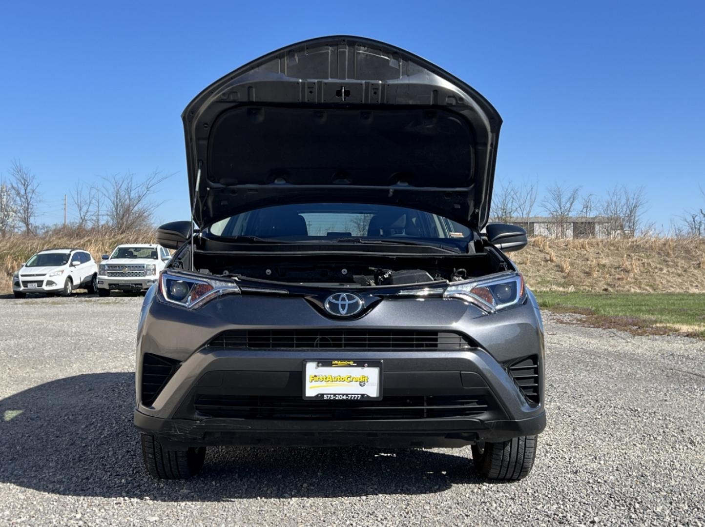 2018 GREY /Black Cloth TOYOTA RAV4 LE (JTMBFREV9JJ) with an 2.5L 4 Cyl. engine, Automatic transmission, located at 506 S. Kingshighway, Cape Girardeau, MO, 63703, 37.294994, -89.556206 - 2018 Toyota RAV4 LE 110xxx miles All Wheel Drive 2.5L 4 Cyl. Automatic Backup Camera Bluetooth Cruise Power Windows/Locks/Mirrors We have financing available and we accept trades! Fill out a credit application on our website or come by today! If you have any questions, give us a call at (5 - Photo#28