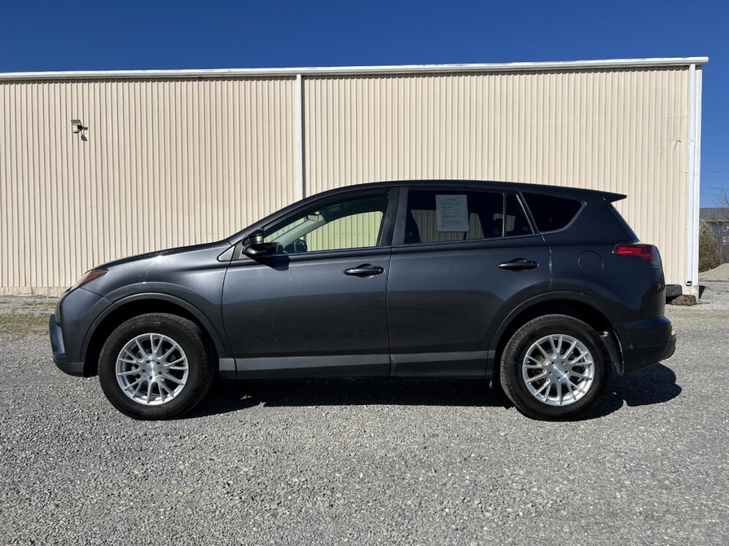 2018 GREY /Black Cloth TOYOTA RAV4 LE (JTMBFREV9JJ) with an 2.5L 4 Cyl. engine, Automatic transmission, located at 506 S. Kingshighway, Cape Girardeau, MO, 63703, 37.294994, -89.556206 - 2018 Toyota RAV4 LE 110xxx miles All Wheel Drive 2.5L 4 Cyl. Automatic Backup Camera Bluetooth Cruise Power Windows/Locks/Mirrors We have financing available and we accept trades! Fill out a credit application on our website or come by today! If you have any questions, give us a call at (5 - Photo#4