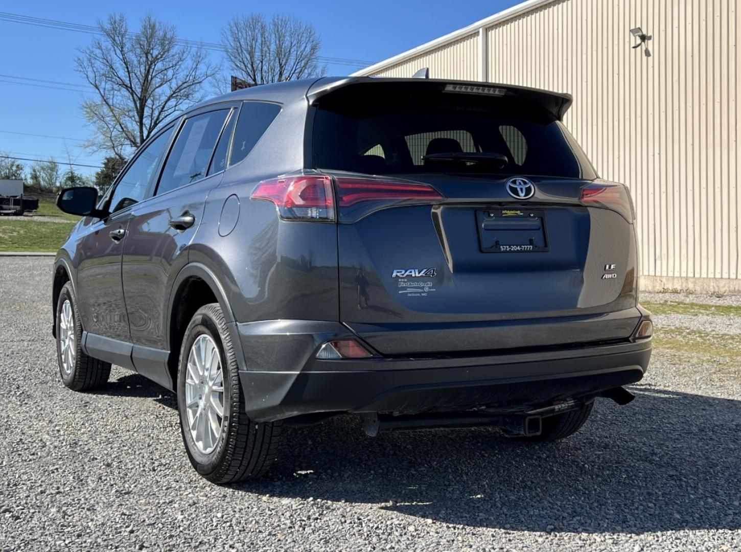 2018 GREY /Black Cloth TOYOTA RAV4 LE (JTMBFREV9JJ) with an 2.5L 4 Cyl. engine, Automatic transmission, located at 506 S. Kingshighway, Cape Girardeau, MO, 63703, 37.294994, -89.556206 - 2018 Toyota RAV4 LE 110xxx miles All Wheel Drive 2.5L 4 Cyl. Automatic Backup Camera Bluetooth Cruise Power Windows/Locks/Mirrors We have financing available and we accept trades! Fill out a credit application on our website or come by today! If you have any questions, give us a call at (5 - Photo#7