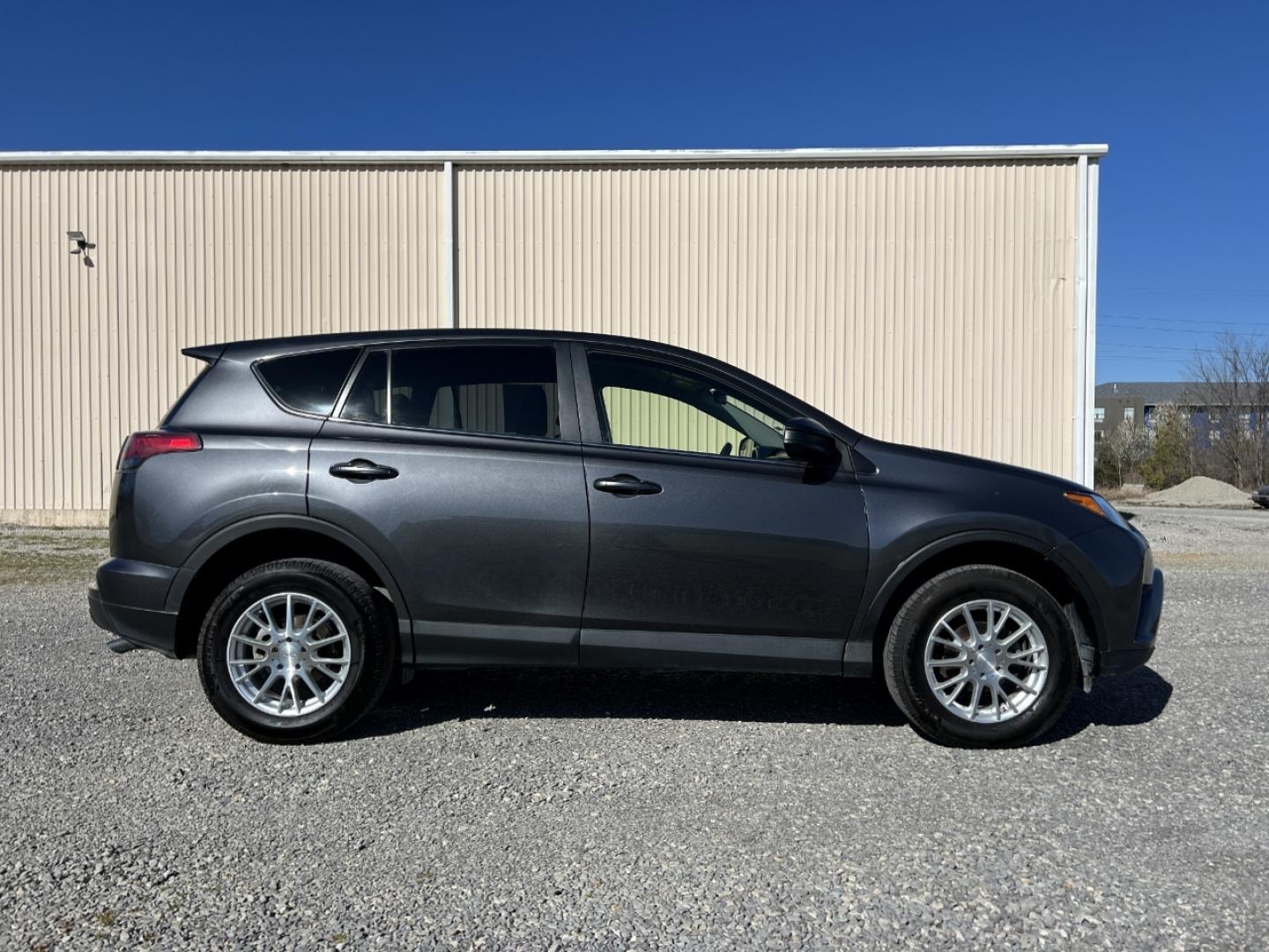 2018 GREY /Black Cloth TOYOTA RAV4 LE (JTMBFREV9JJ) with an 2.5L 4 Cyl. engine, Automatic transmission, located at 506 S. Kingshighway, Cape Girardeau, MO, 63703, 37.294994, -89.556206 - 2018 Toyota RAV4 LE 110xxx miles All Wheel Drive 2.5L 4 Cyl. Automatic Backup Camera Bluetooth Cruise Power Windows/Locks/Mirrors We have financing available and we accept trades! Fill out a credit application on our website or come by today! If you have any questions, give us a call at (5 - Photo#5