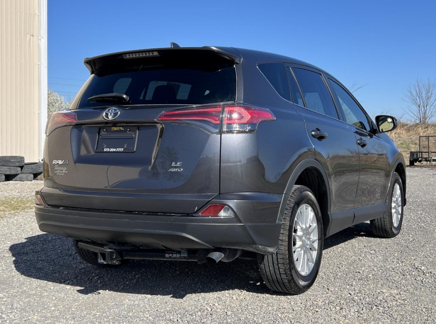 2018 GREY /Black Cloth TOYOTA RAV4 LE (JTMBFREV9JJ) with an 2.5L 4 Cyl. engine, Automatic transmission, located at 506 S. Kingshighway, Cape Girardeau, MO, 63703, 37.294994, -89.556206 - 2018 Toyota RAV4 LE 110xxx miles All Wheel Drive 2.5L 4 Cyl. Automatic Backup Camera Bluetooth Cruise Power Windows/Locks/Mirrors We have financing available and we accept trades! Fill out a credit application on our website or come by today! If you have any questions, give us a call at (5 - Photo#6