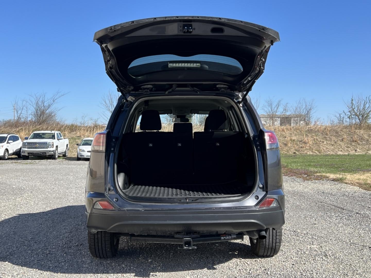 2018 GREY /Black Cloth TOYOTA RAV4 LE (JTMBFREV9JJ) with an 2.5L 4 Cyl. engine, Automatic transmission, located at 506 S. Kingshighway, Cape Girardeau, MO, 63703, 37.294994, -89.556206 - 2018 Toyota RAV4 LE 110xxx miles All Wheel Drive 2.5L 4 Cyl. Automatic Backup Camera Bluetooth Cruise Power Windows/Locks/Mirrors We have financing available and we accept trades! Fill out a credit application on our website or come by today! If you have any questions, give us a call at (5 - Photo#16