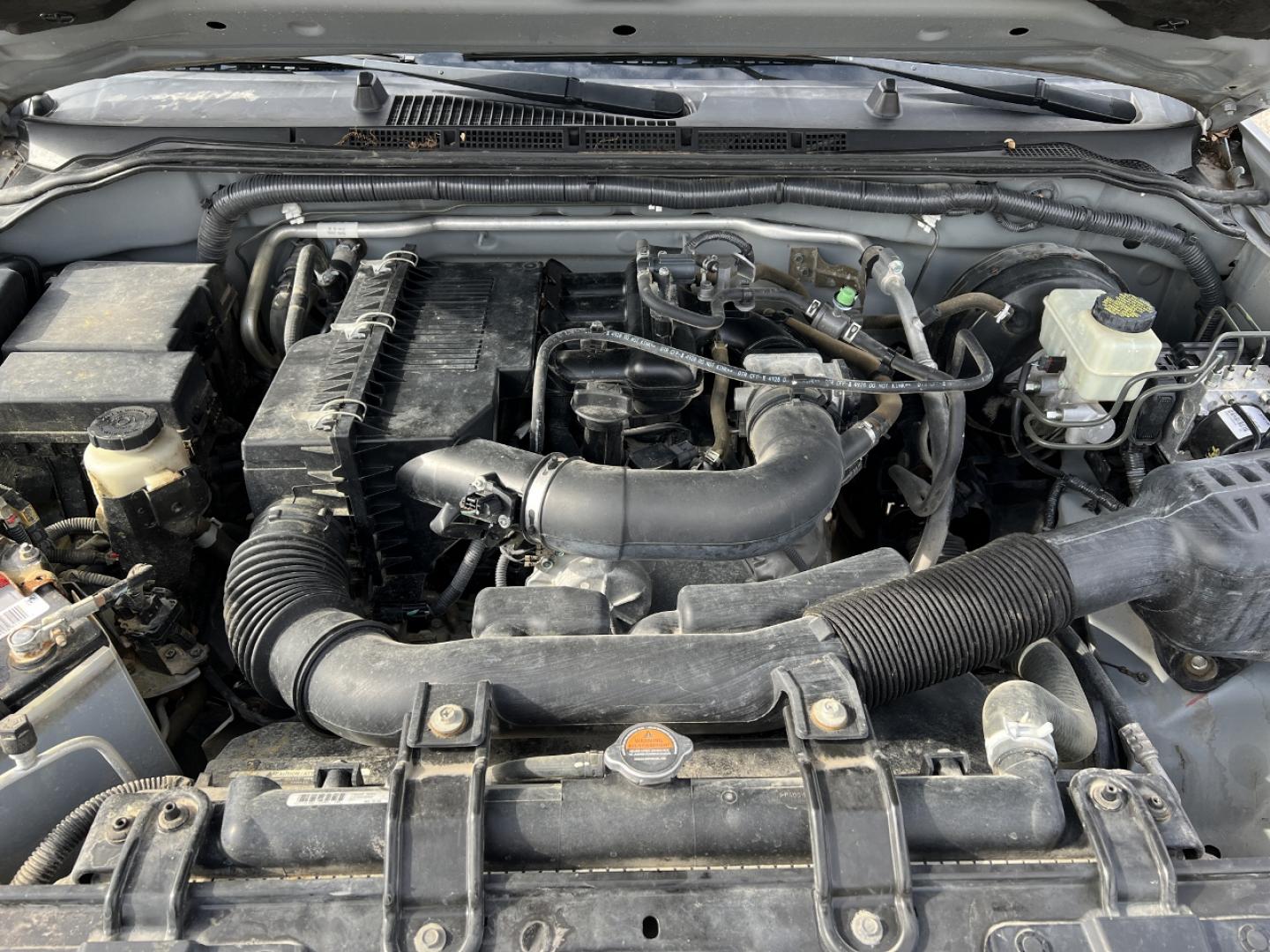 2015 SILVER /Black Cloth NISSAN FRONTIER S (1N6BD0CT5FN) with an 2.5L 4 Cyl. engine, Automatic transmission, located at 2990 Old Orchard Rd., Jackson, MO, 63755, 37.354214, -89.612106 - 2015 Nissan Frontier S 128xxx miles Rear Wheel Drive 2.5L 4 Cyl. Automatic Cruise We have financing available and we accept trades! Fill out a credit application on our website or come by today! If you have any questions, give us a call at (573) 204-7777 or visit our website at firstautocredi - Photo#27