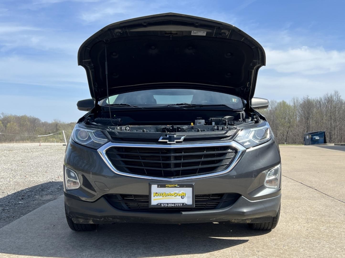2019 GRAY /Black/Gray Cloth CHEVROLET EQUINOX LS (2GNAXHEV8K6) with an 1.5L 4 Cyl. engine, Automatic transmission, located at 506 S. Kingshighway, Cape Girardeau, MO, 63703, 37.294994, -89.556206 - 2019 Chevrolet Equinox LS 110xxx miles Front Wheel Drive 1.5L 4 Cyl. Automatic Power Driver Seat Backup Camera Bluetooth Remote Start Cruise Power Windows/Locks/Mirrors We have financing available and we accept trades! Fill out a credit application on our website or come by today! If you - Photo#33