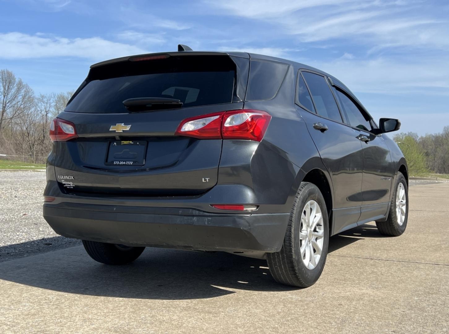2019 GRAY /Black/Gray Cloth CHEVROLET EQUINOX LS (2GNAXHEV8K6) with an 1.5L 4 Cyl. engine, Automatic transmission, located at 506 S. Kingshighway, Cape Girardeau, MO, 63703, 37.294994, -89.556206 - 2019 Chevrolet Equinox LS 110xxx miles Front Wheel Drive 1.5L 4 Cyl. Automatic Power Driver Seat Backup Camera Bluetooth Remote Start Cruise Power Windows/Locks/Mirrors We have financing available and we accept trades! Fill out a credit application on our website or come by today! If you - Photo#7