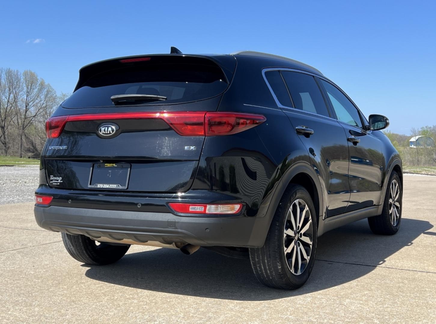 2017 BLACK /Tan Leather KIA SPORTAGE EX (KNDPN3AC3H7) with an 2.4L 4 Cyl. engine, Automatic transmission, located at 506 S. Kingshighway, Cape Girardeau, MO, 63703, 37.294994, -89.556206 - 2017 Kia Sportage EX 120xxx miles Front Wheel Drive 2.4L 4 Cyl. Automatic Leather Navigation Power/Heated/Cooled Seats Backup Camera Sunroof Bluetooth Cruise Power Windows/Locks/Mirrors We have financing available and we accept trades! Fill out a credit application on our website or com - Photo#10