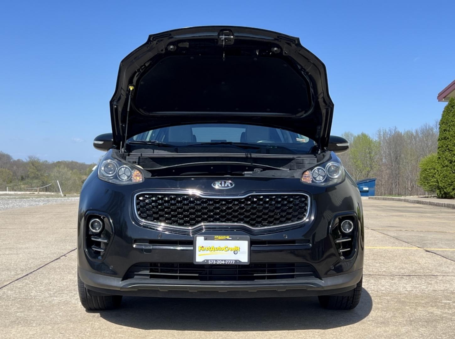 2017 BLACK /Tan Leather KIA SPORTAGE EX (KNDPN3AC3H7) with an 2.4L 4 Cyl. engine, Automatic transmission, located at 506 S. Kingshighway, Cape Girardeau, MO, 63703, 37.294994, -89.556206 - 2017 Kia Sportage EX 120xxx miles Front Wheel Drive 2.4L 4 Cyl. Automatic Leather Navigation Power/Heated/Cooled Seats Backup Camera Sunroof Bluetooth Cruise Power Windows/Locks/Mirrors We have financing available and we accept trades! Fill out a credit application on our website or com - Photo#35