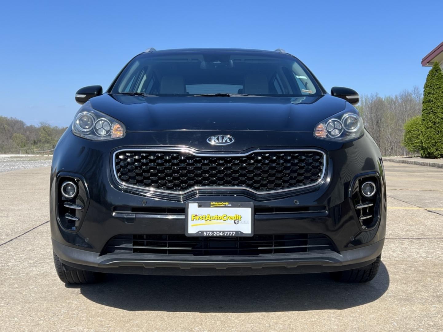 2017 BLACK /Tan Leather KIA SPORTAGE EX (KNDPN3AC3H7) with an 2.4L 4 Cyl. engine, Automatic transmission, located at 506 S. Kingshighway, Cape Girardeau, MO, 63703, 37.294994, -89.556206 - 2017 Kia Sportage EX 120xxx miles Front Wheel Drive 2.4L 4 Cyl. Automatic Leather Navigation Power/Heated/Cooled Seats Backup Camera Sunroof Bluetooth Cruise Power Windows/Locks/Mirrors We have financing available and we accept trades! Fill out a credit application on our website or com - Photo#13