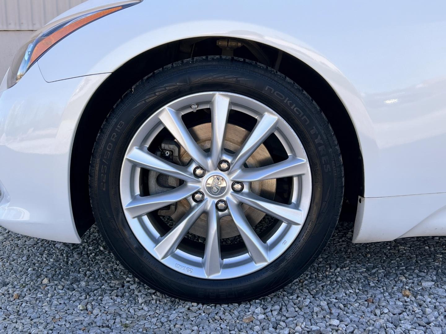 2014 WHITE /Tan Leather INFINITI Q60 BASE (JN1CV6FE3EM) with an 3.7L V6 engine, Automatic transmission, located at 506 S. Kingshighway, Cape Girardeau, MO, 63703, 37.294994, -89.556206 - 2014 Infiniti Q60 Convertible Only 84xxx miles Rear Wheel Drive 3.7L V6 Automatic Leather Navigation Power/Heated/Cooled Seats Backup Camera Bluetooth Cruise Power Windows/Locks/Mirrors We have financing available and we accept trades! Fill out a credit application on our website or come - Photo#33