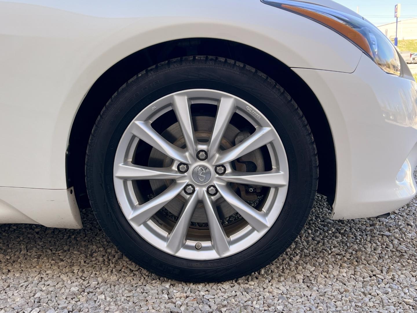 2014 WHITE /Tan Leather INFINITI Q60 BASE (JN1CV6FE3EM) with an 3.7L V6 engine, Automatic transmission, located at 506 S. Kingshighway, Cape Girardeau, MO, 63703, 37.294994, -89.556206 - 2014 Infiniti Q60 Convertible Only 84xxx miles Rear Wheel Drive 3.7L V6 Automatic Leather Navigation Power/Heated/Cooled Seats Backup Camera Bluetooth Cruise Power Windows/Locks/Mirrors We have financing available and we accept trades! Fill out a credit application on our website or come - Photo#37