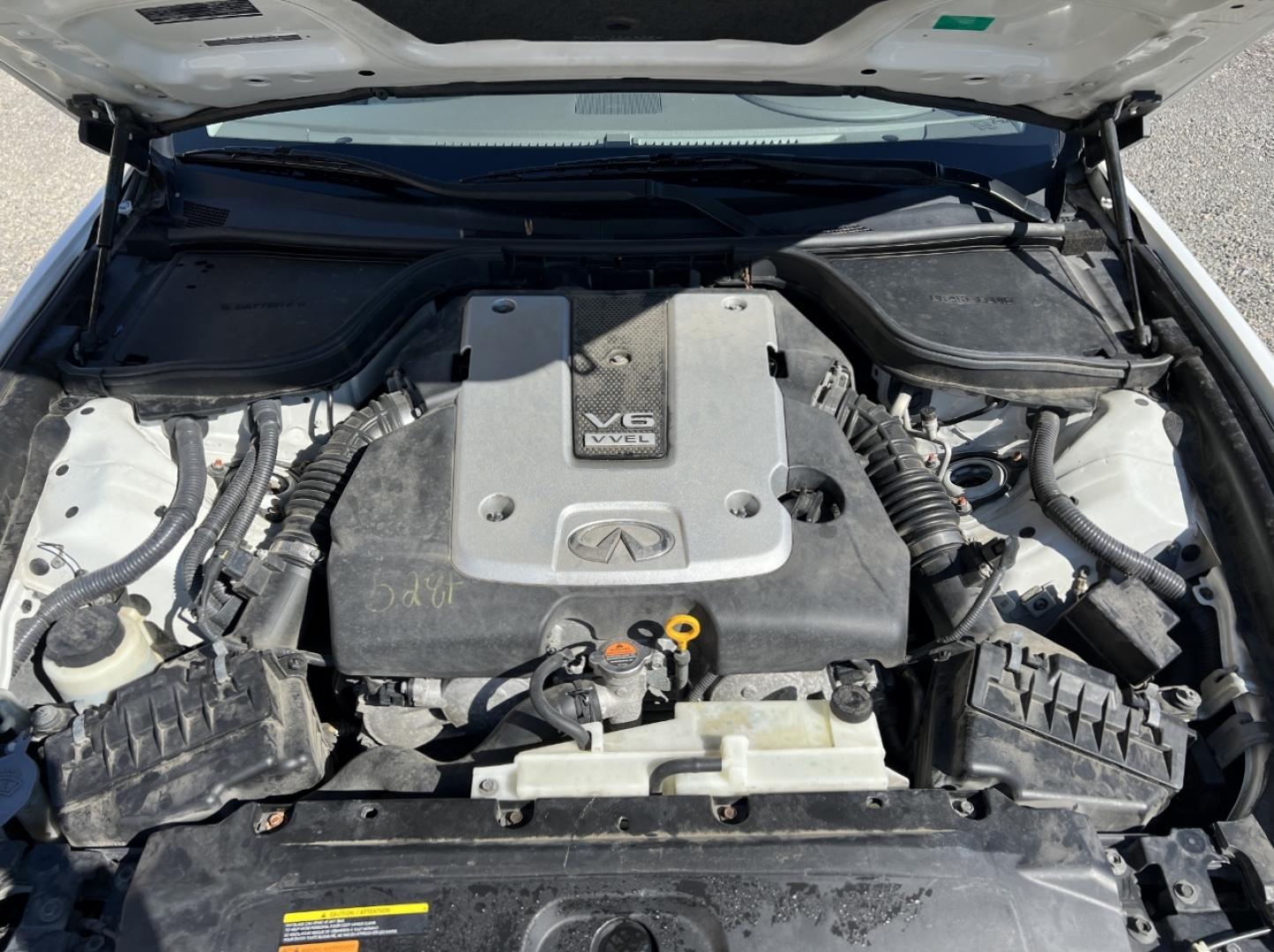 2014 WHITE /Tan Leather INFINITI Q60 BASE (JN1CV6FE3EM) with an 3.7L V6 engine, Automatic transmission, located at 506 S. Kingshighway, Cape Girardeau, MO, 63703, 37.294994, -89.556206 - 2014 Infiniti Q60 Convertible Only 84xxx miles Rear Wheel Drive 3.7L V6 Automatic Leather Navigation Power/Heated/Cooled Seats Backup Camera Bluetooth Cruise Power Windows/Locks/Mirrors We have financing available and we accept trades! Fill out a credit application on our website or come - Photo#32
