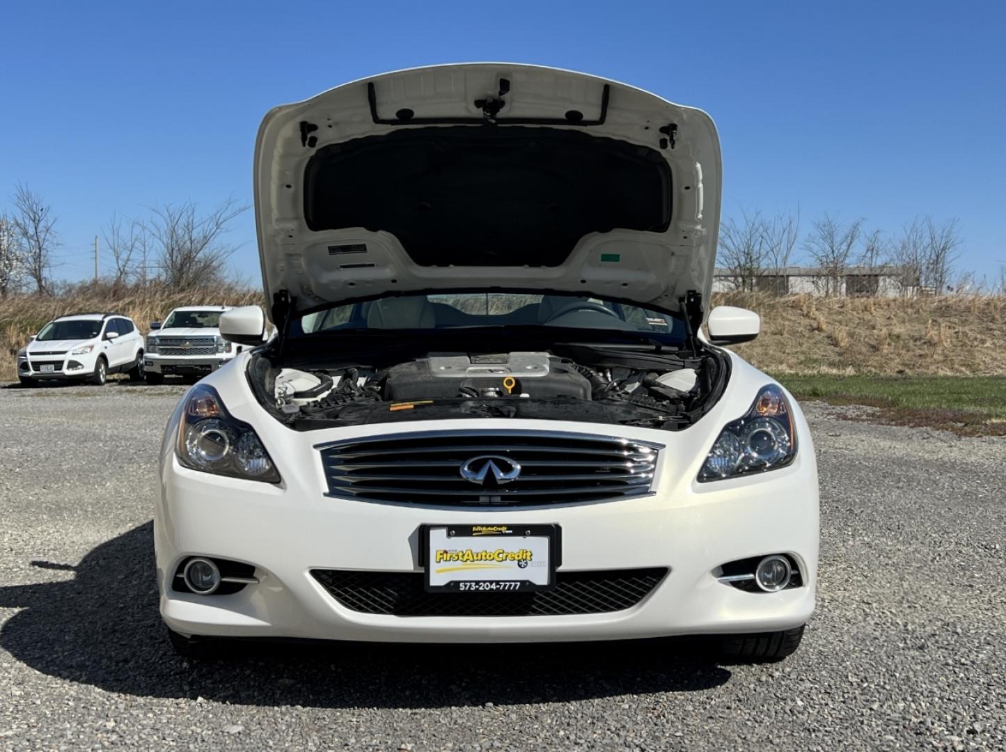 2014 WHITE /Tan Leather INFINITI Q60 BASE (JN1CV6FE3EM) with an 3.7L V6 engine, Automatic transmission, located at 506 S. Kingshighway, Cape Girardeau, MO, 63703, 37.294994, -89.556206 - 2014 Infiniti Q60 Convertible Only 84xxx miles Rear Wheel Drive 3.7L V6 Automatic Leather Navigation Power/Heated/Cooled Seats Backup Camera Bluetooth Cruise Power Windows/Locks/Mirrors We have financing available and we accept trades! Fill out a credit application on our website or come - Photo#31