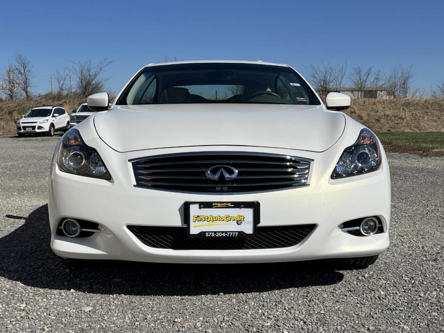 2014 WHITE /Tan Leather INFINITI Q60 BASE (JN1CV6FE3EM) with an 3.7L V6 engine, Automatic transmission, located at 506 S. Kingshighway, Cape Girardeau, MO, 63703, 37.294994, -89.556206 - 2014 Infiniti Q60 Convertible Only 84xxx miles Rear Wheel Drive 3.7L V6 Automatic Leather Navigation Power/Heated/Cooled Seats Backup Camera Bluetooth Cruise Power Windows/Locks/Mirrors We have financing available and we accept trades! Fill out a credit application on our website or come - Photo#12